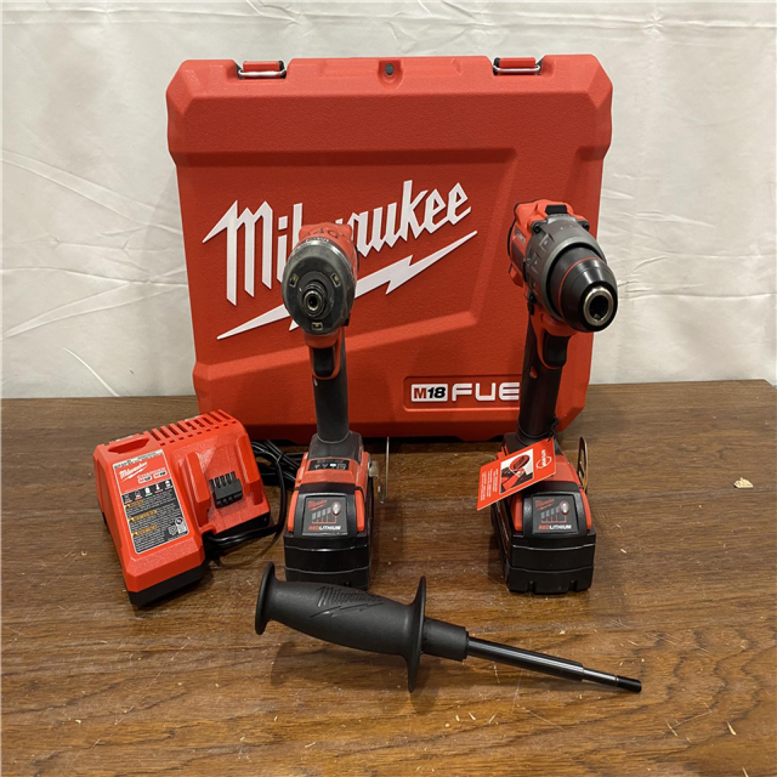 AS-IS Milwaukee M18 FUEL 18V Lithium-Ion Brushless Cordless Hammer Drill and Impact Driver Combo Kit (2-Tool) with 2 Batteries