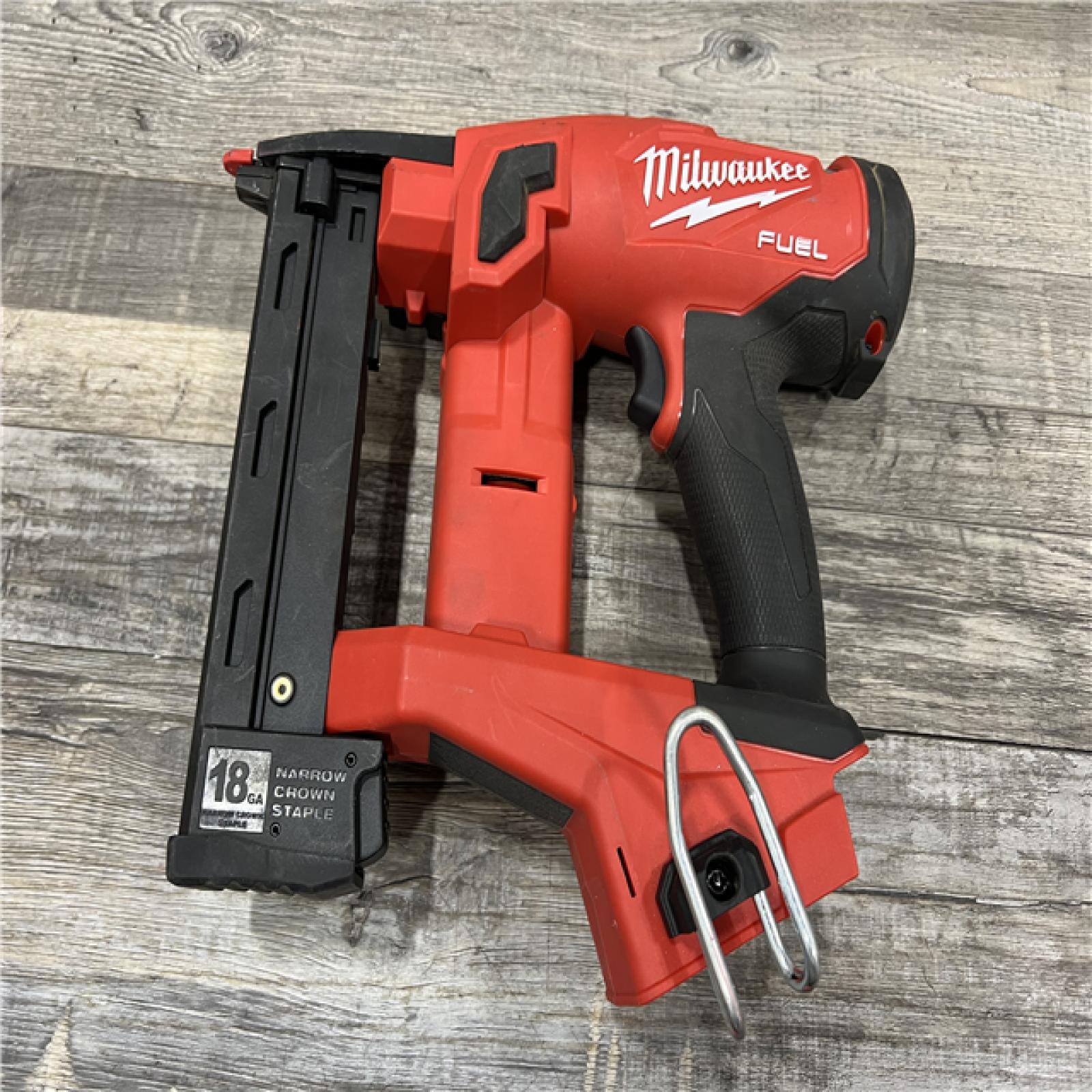 AS-IS MILWAUKEE M18 FUEL 18-Volt Lithium-Ion Brushless Cordless 18-Gauge 1/4 in. Narrow Crown Stapler (Tool-Only)