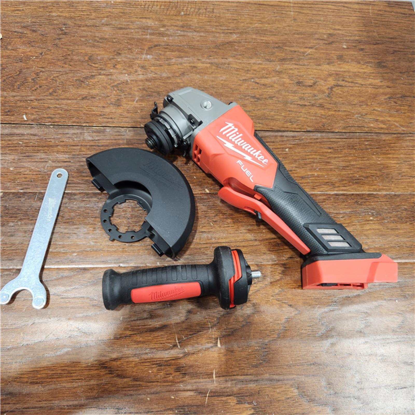 AS-IS Milwaukee 2880-20 M18 FUEL 18-Volt Lithium-Ion Brushless Cordless 4-1/2 in./5 in. Grinder W/Paddle Switch (Tool-Only)