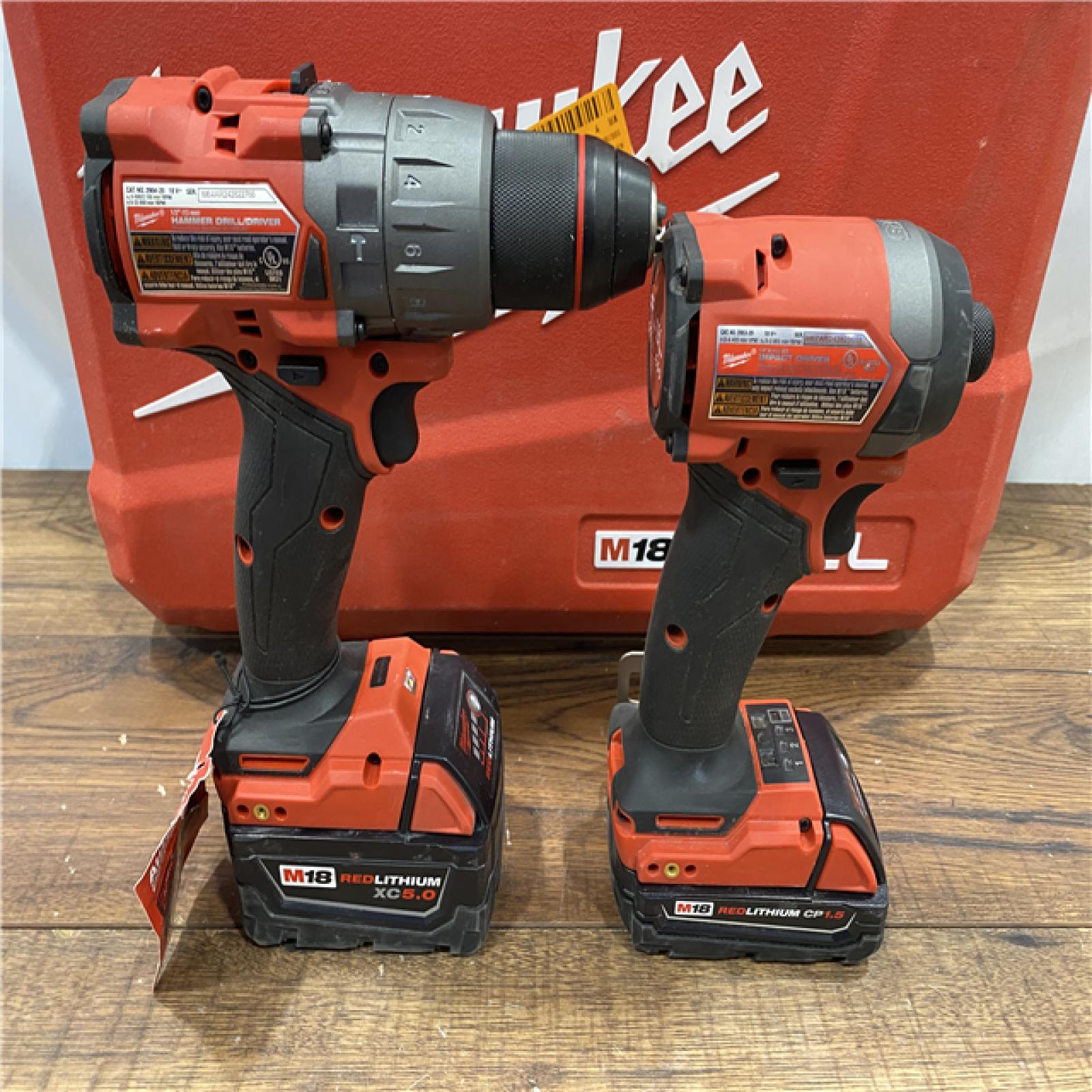 AS IS Milwaukee M18 FUEL 18V Lithium-Ion Brushless Cordless Hammer Drill and Impact Driver Combo Kit (2-Tool) with 2 Batteries