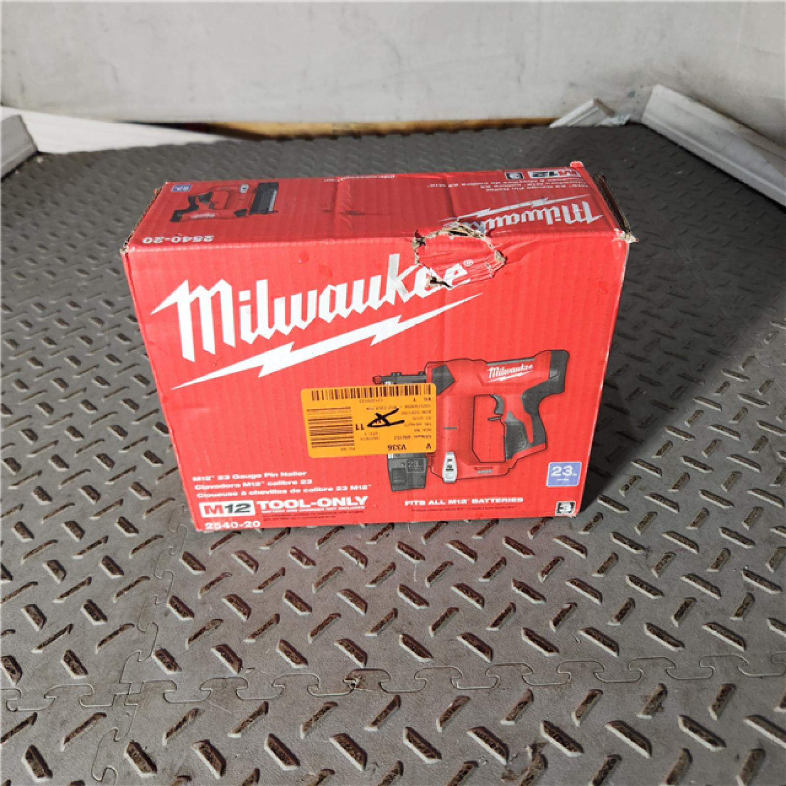 Houston location AS- IS MILWUAKEE M12 12-Volt 23-Gauge Lithium-Ion Cordless Pin Nailer (Tool-Only)