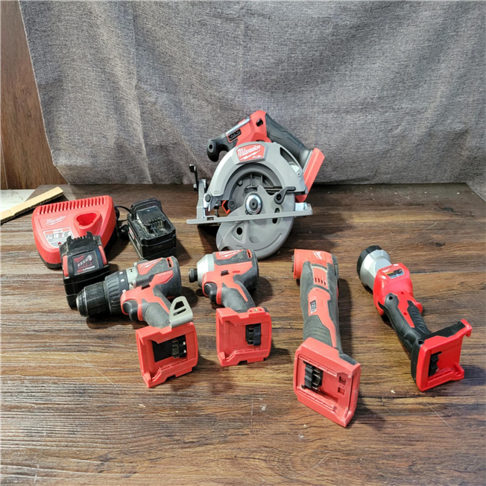 CALIFORNIA AS-IS MILWAUKEE M18 FUEL 5-TOOL COMBO KIT(BATTERIES,CHARGER,AND BAG INCLUDED)