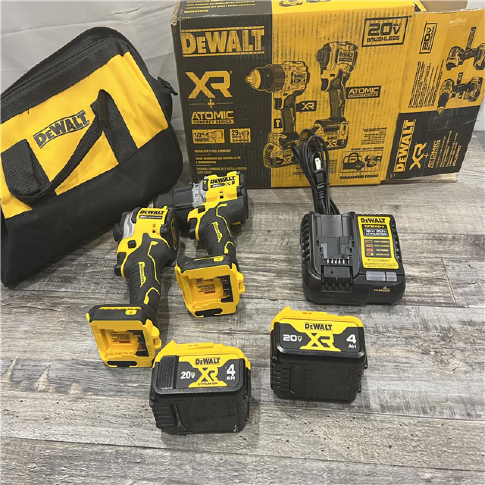 AS-IS DEWALT 20V MAX XR Hammer Drill and ATOMIC Impact Driver 2 Tool Cordless Combo Kit with (2) 4.0Ah Batteries, Charger, and Bag