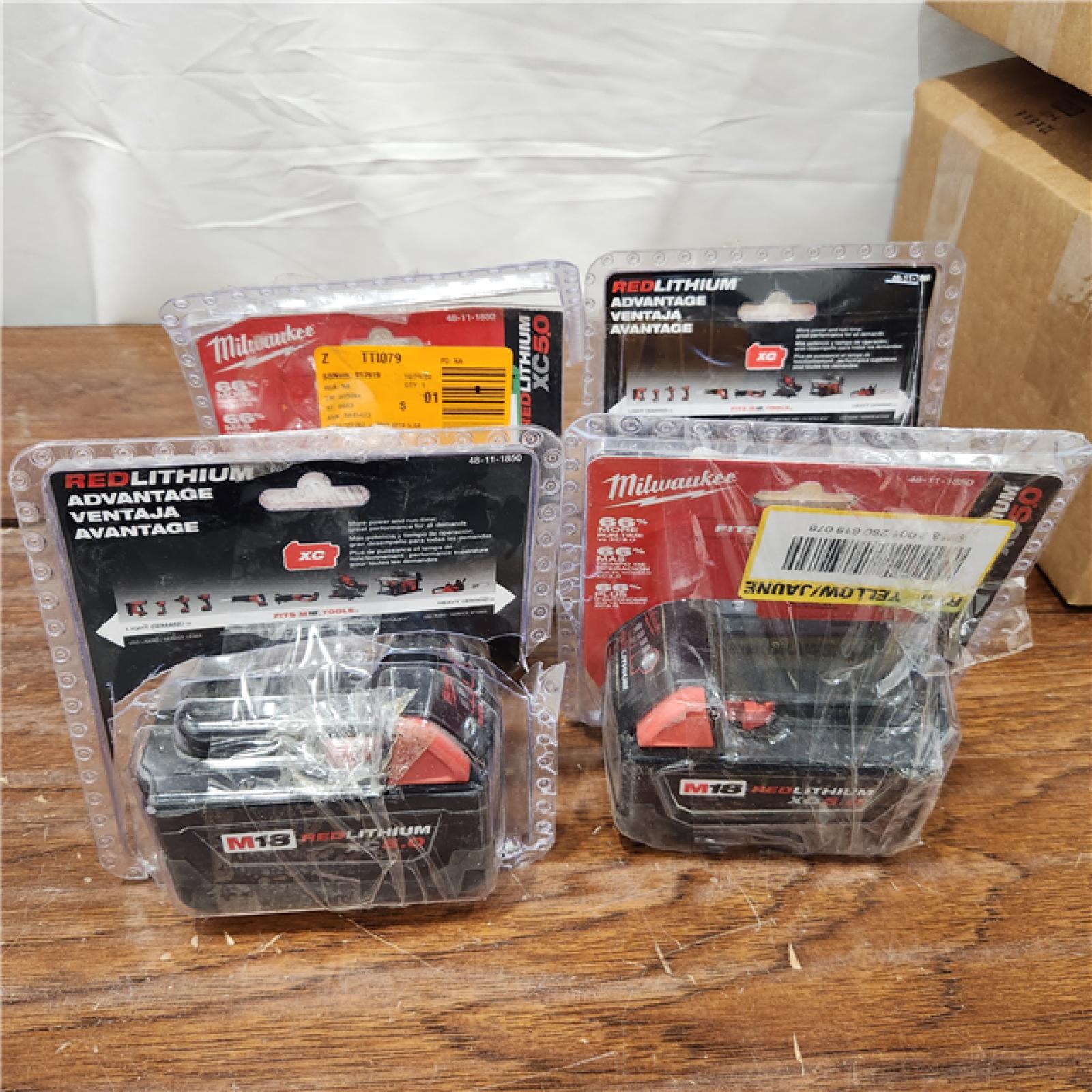 AS-IS Milwaukee M18 18-Volt Lithium-Ion XC Extended Capacity 5.0Ah Battery Pack	 (4PACK)