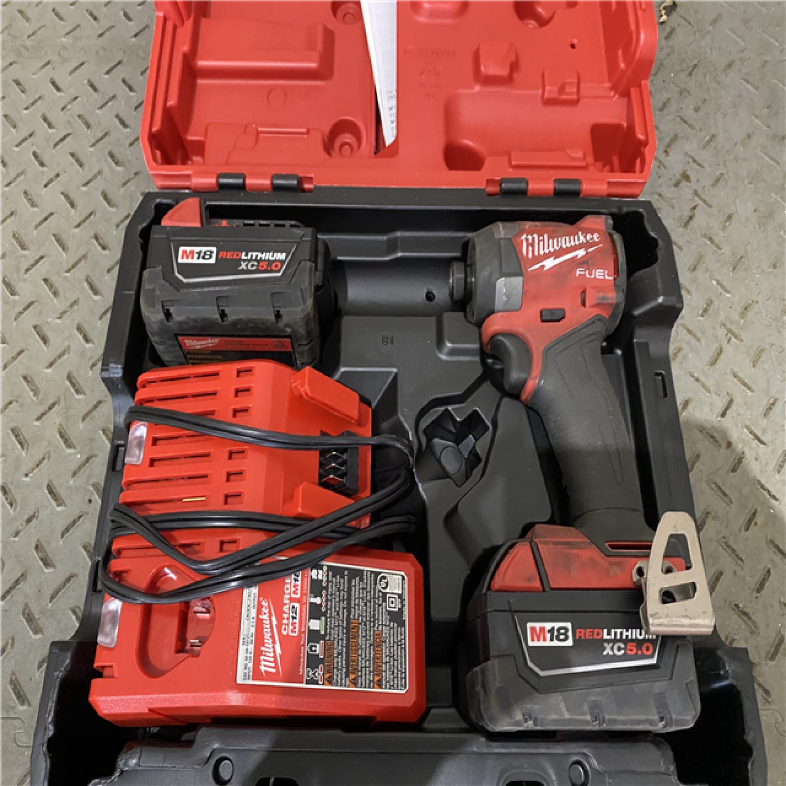 Houston location AS-IS Milwaukee 2953-22 M18 FUELâ„¢ 1/4   Hex Impact Driver Kit