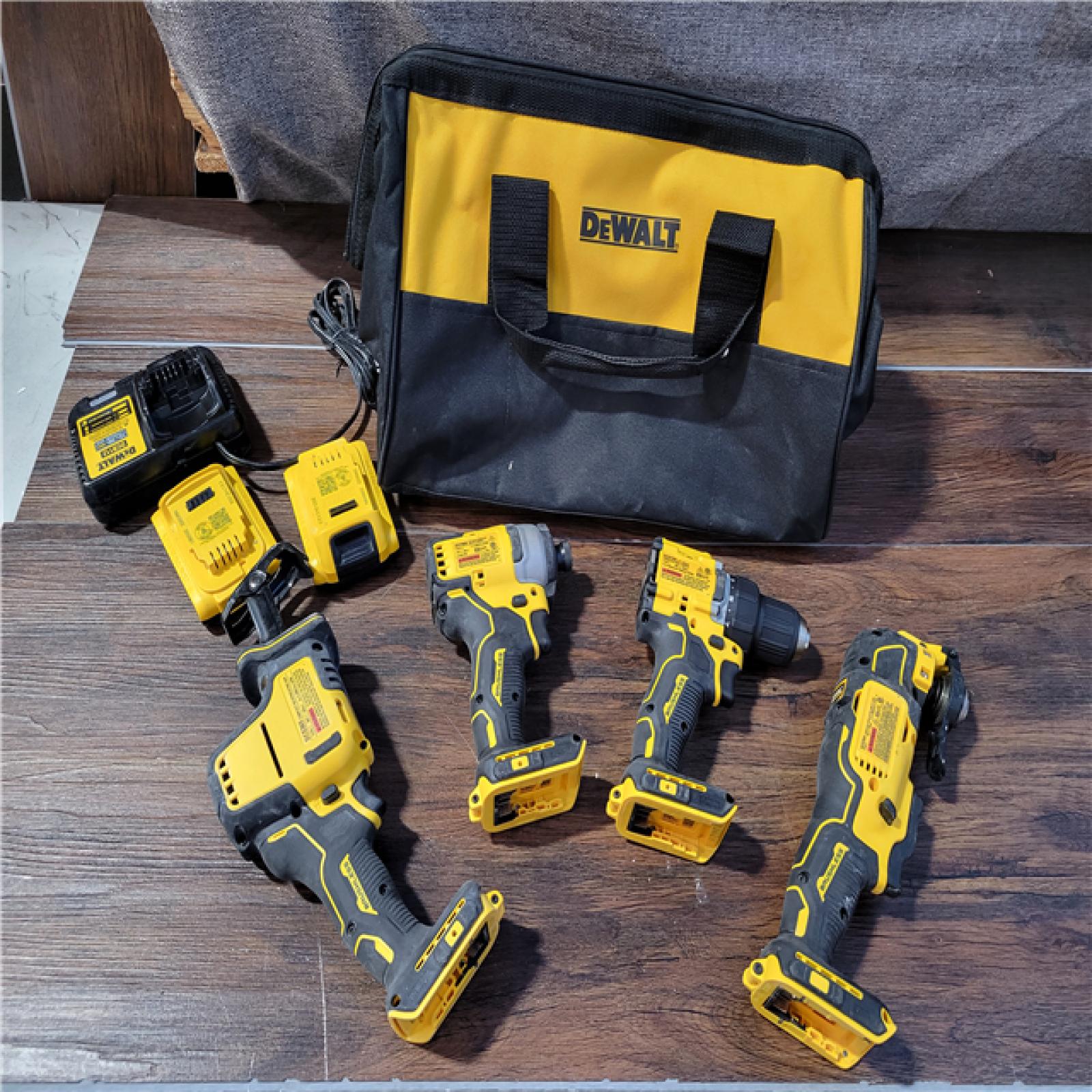 CALIFORNIA USED DEWALT BRUSHLESS 4-TOOL COMBO KIT (2 BATTERIES, 1 CHARGER, AND BAG INCLUDED)