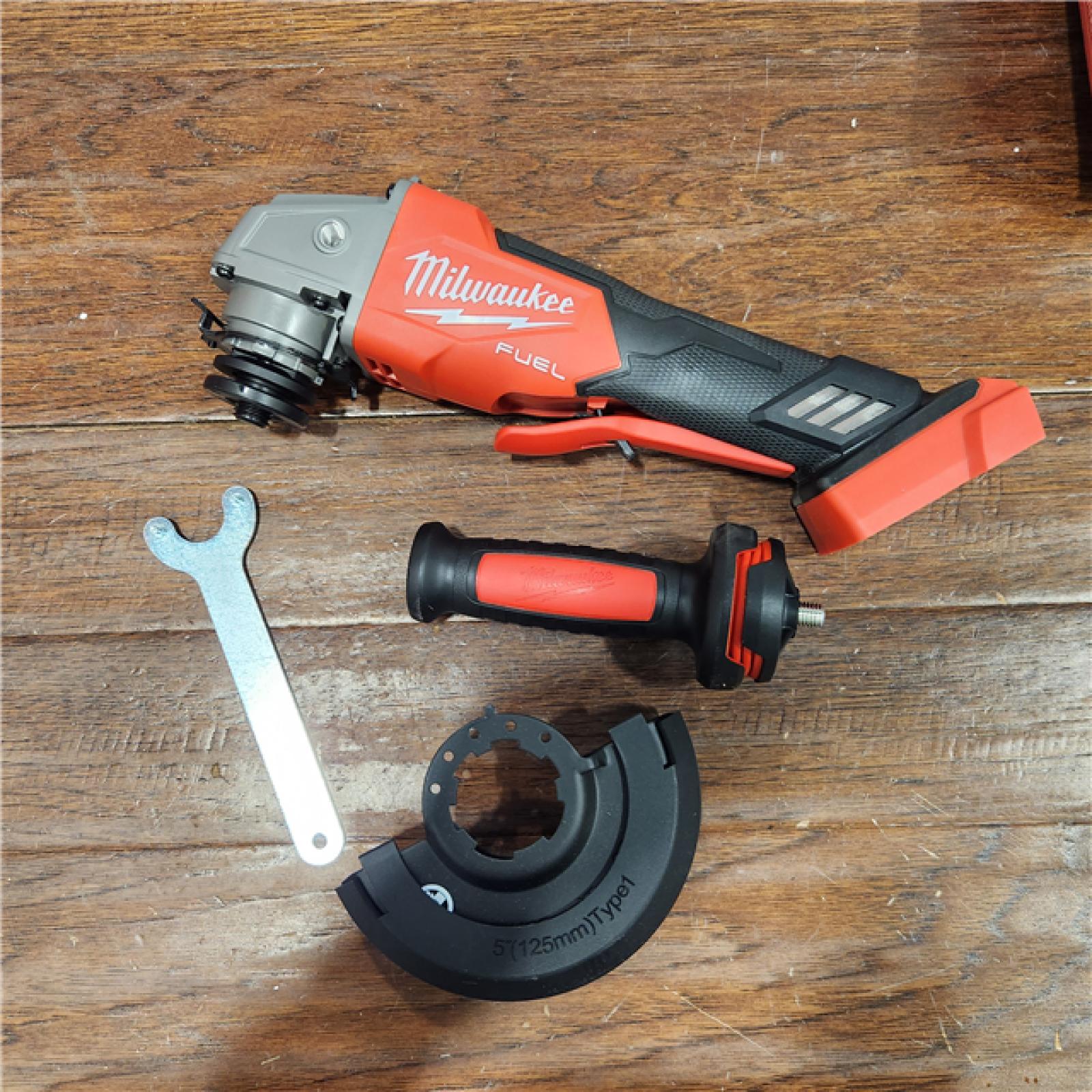 AS-IS Milwaukee 2880-20 M18 FUEL 18-Volt Lithium-Ion Brushless Cordless 4-1/2 in./5 in. Grinder W/Paddle Switch (Tool-Only)