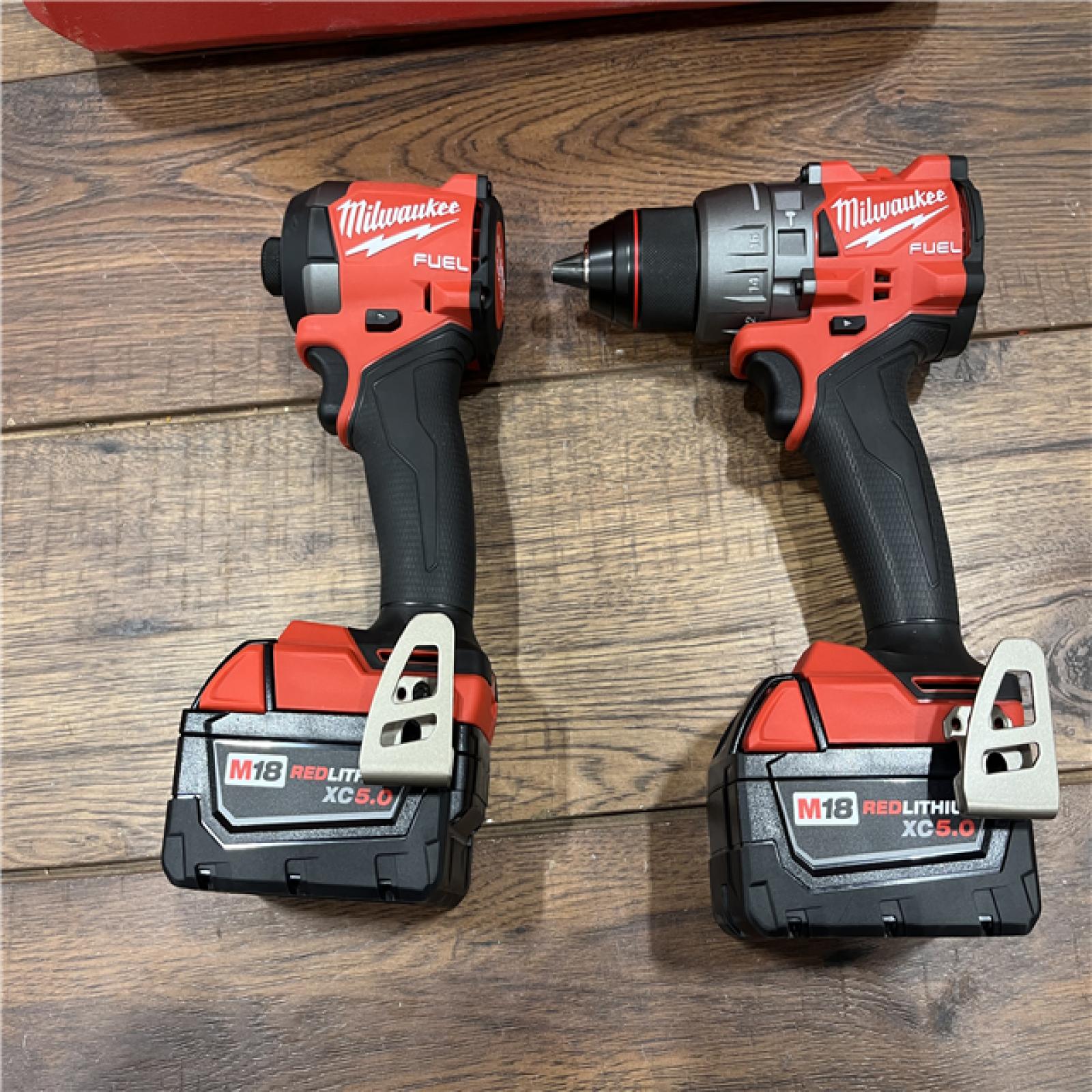 AS-IS Milwaukee M18 FUEL 18V Lithium-Ion Brushless Cordless Hammer Drill and Impact Driver Combo Kit (2-Tool) with 2 Batteries