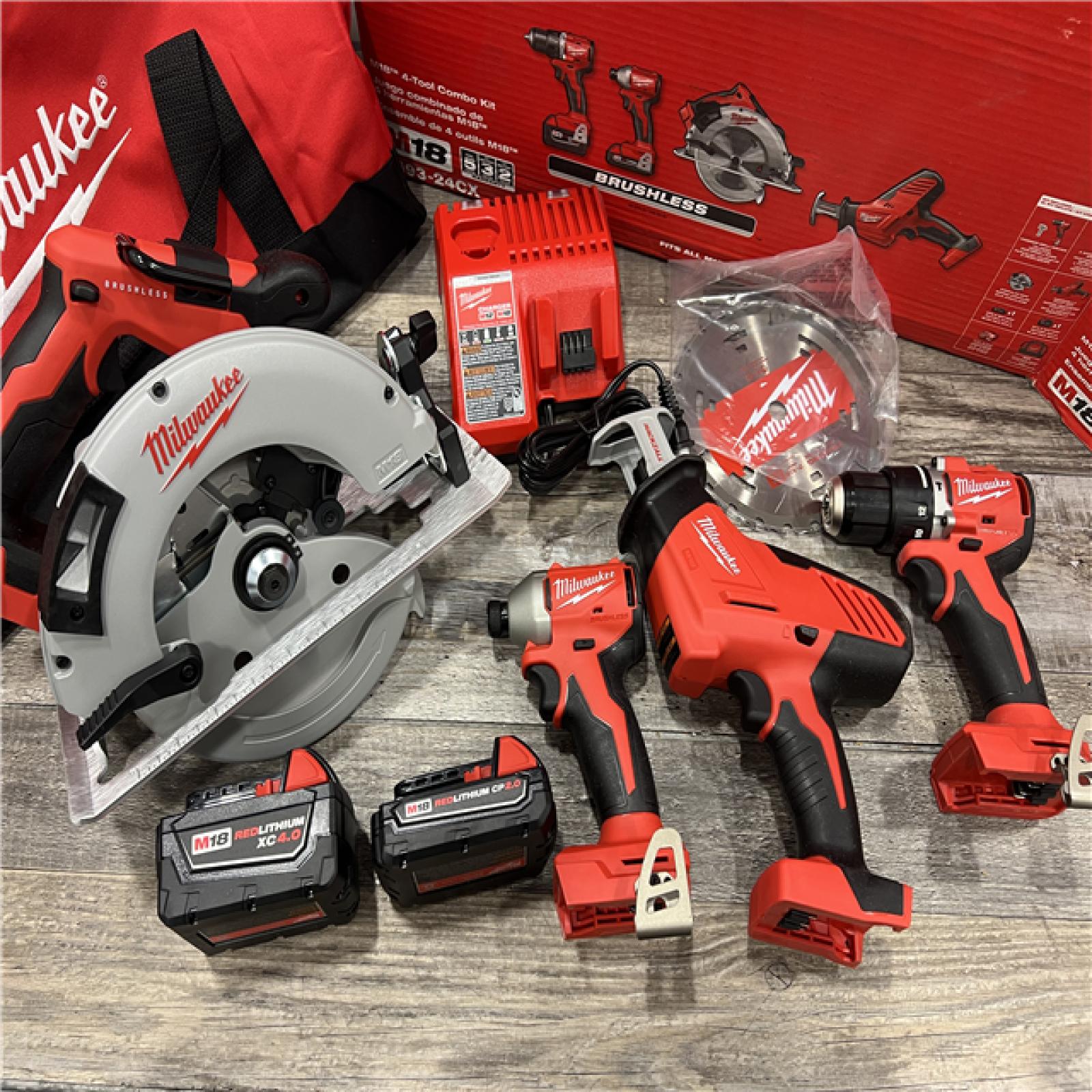 AS-IS MILWAUKEE M18 18-Volt Lithium-Ion Brushless Cordless Combo Kit (4-Tool) with 2-Batteries, 1-Charger and Tool Bag