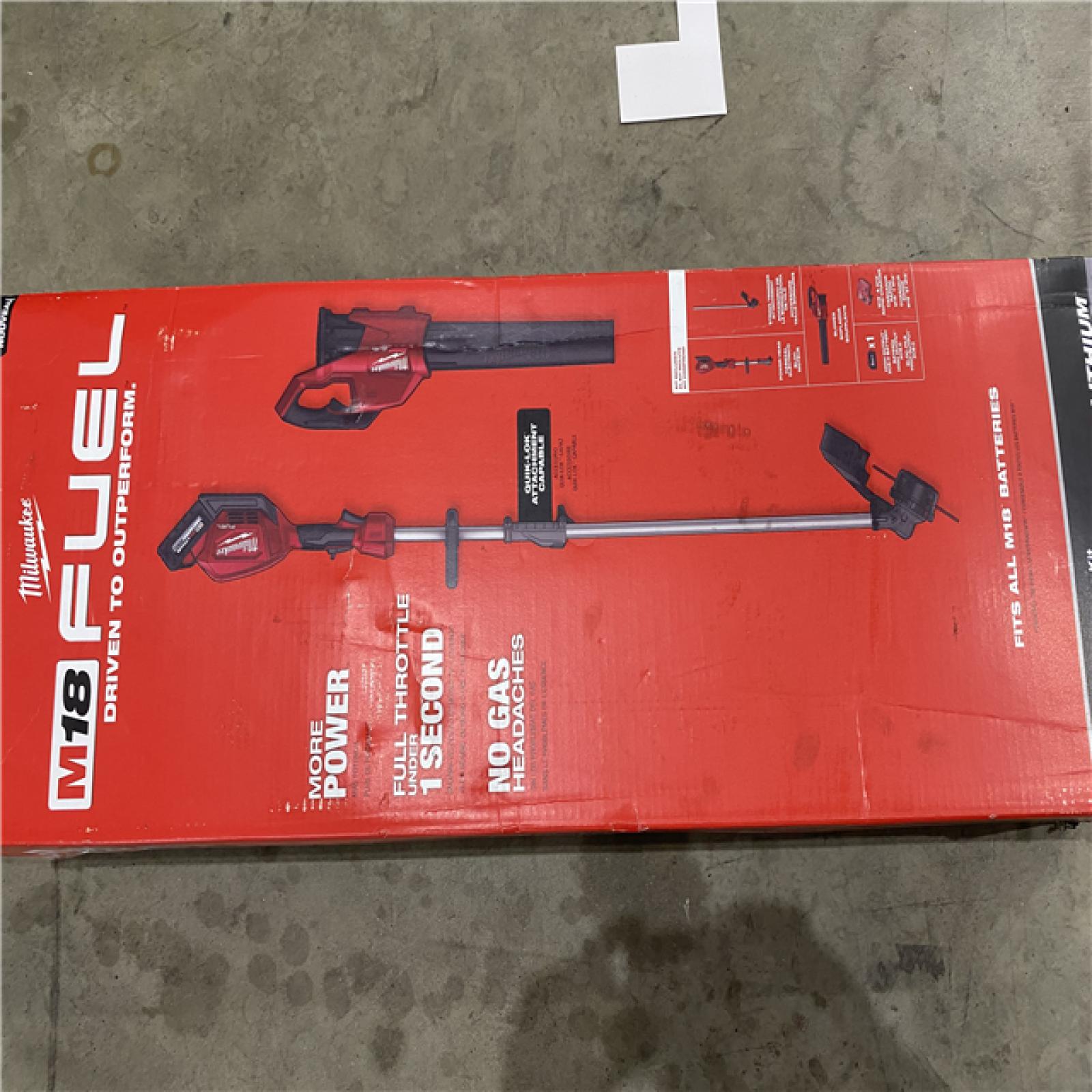 Houston location AS-IS Milwaukee 3000-21 M18 FUEL Brushless Lithium-Ion Cordless String Trimmer with QUIK-LOK / Blower Combo Kit (8 Ah)