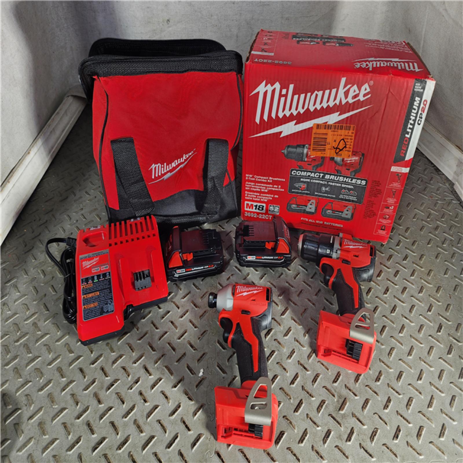 HOUSTON LOCATION - AS-IS (APPEARS LIKE NEW) M18 18V Lithium-Ion Brushless Cordless Compact Drill/Impact Combo Kit (2-Tool) W/(2) 2.0 Ah Batteries, Charger & Bag