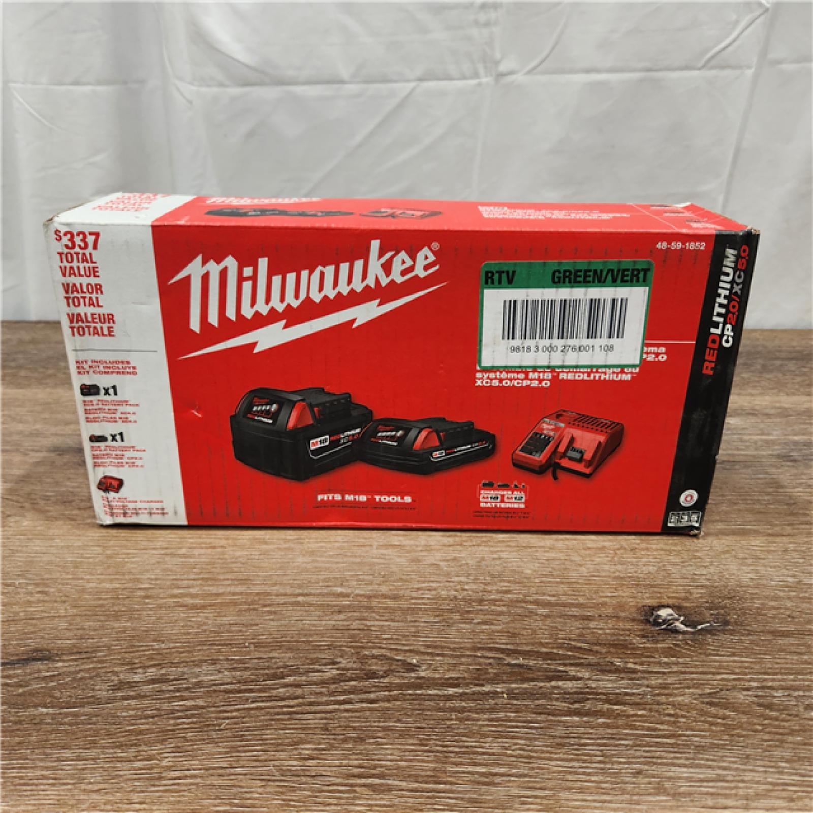 AS-IS Milwaukee M18 18-Volt Lithium-Ion Starter Kit with One 5.0 Ah and One 2.0 Ah Battery and Charger