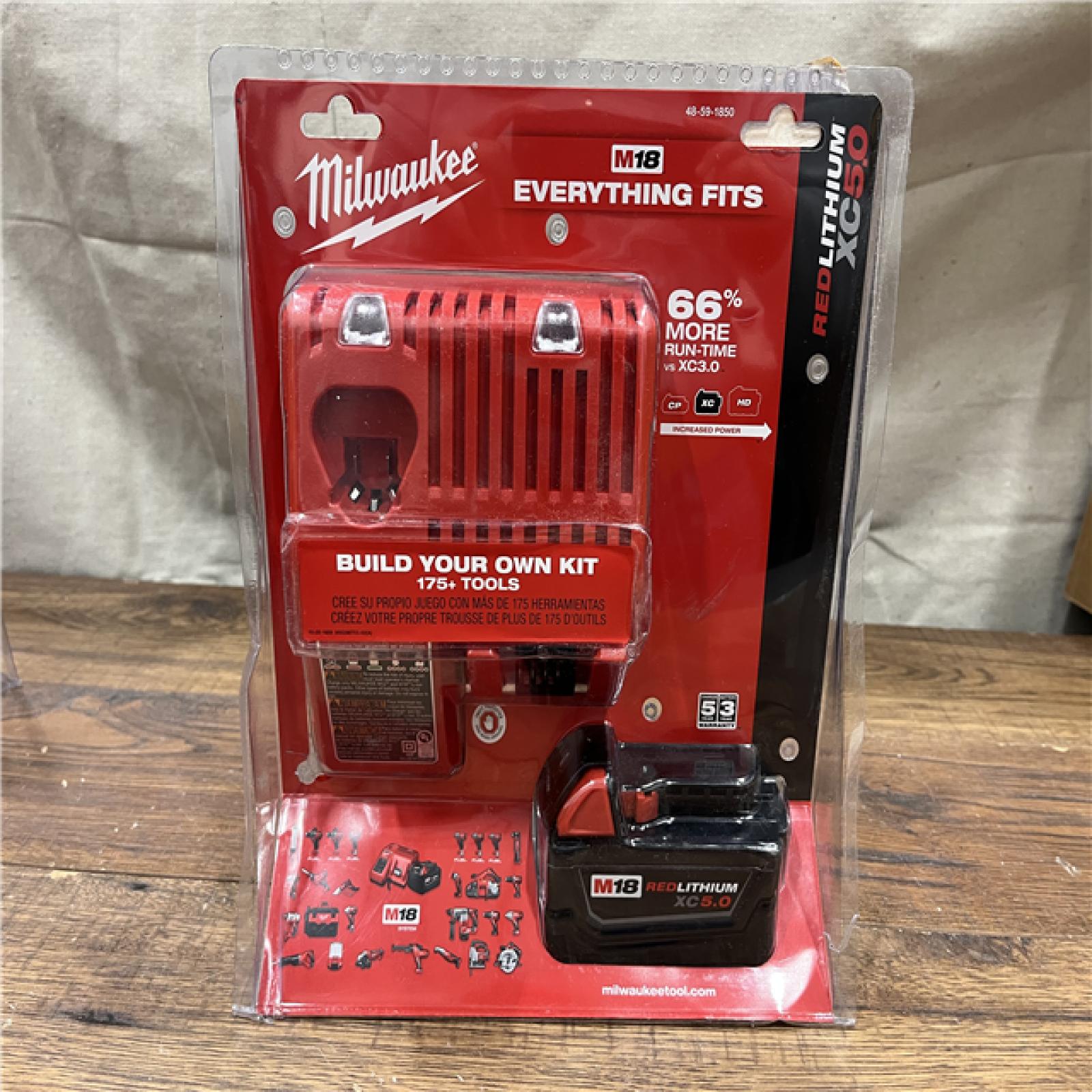 NEW - Milwaukee M18 18-Volt Lithium-Ion XC Starter Kit with (1) 5.0Ah Battery and Charger