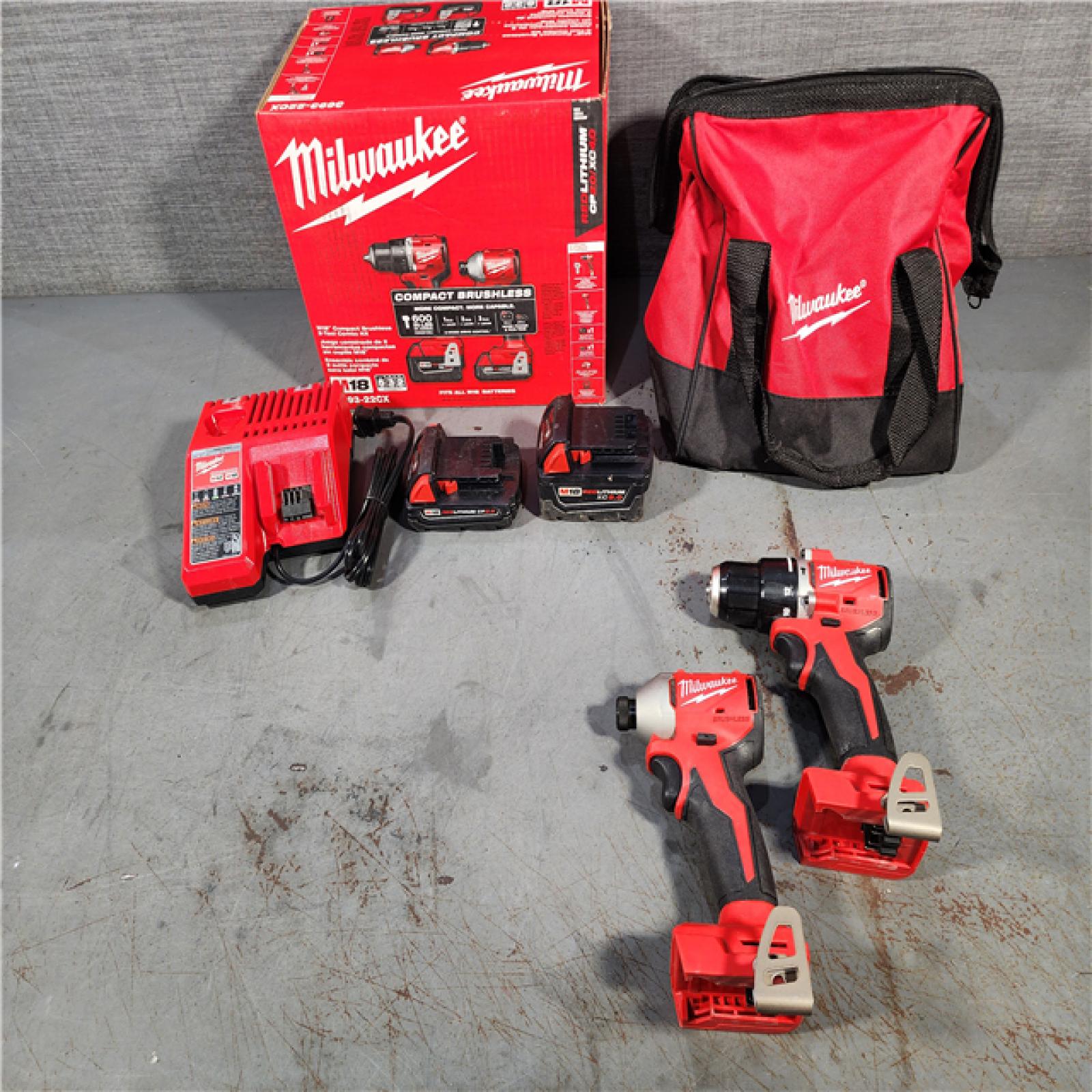 HOUSTON LOCATION - AS-IS M18 18-Volt Lithium-Ion Brushless Cordless Compact Hammer Drill/Impact Combo Kit (2-Tool) with (2) Batteries, Bag