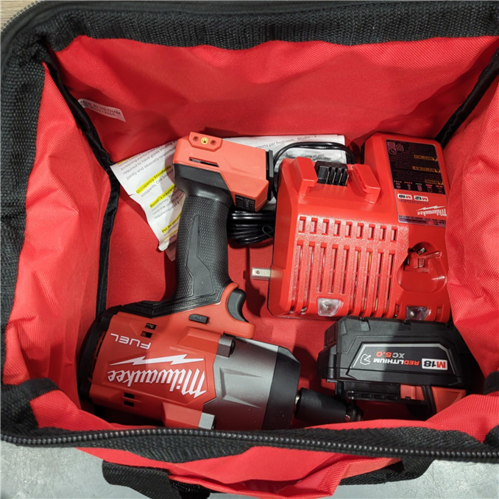 AS-IS Milwaukee M18 1/2 in. Cordless Brushless High Torque Impact Wrench Kit (Battery & Charger)