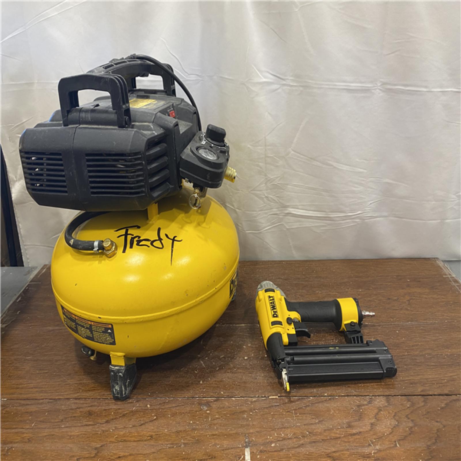 AS-ISDEWALT 6 Gal. 18-Gauge Brad Nailer and Heavy-Duty Pancake Electric Air Compressor Combo Kit