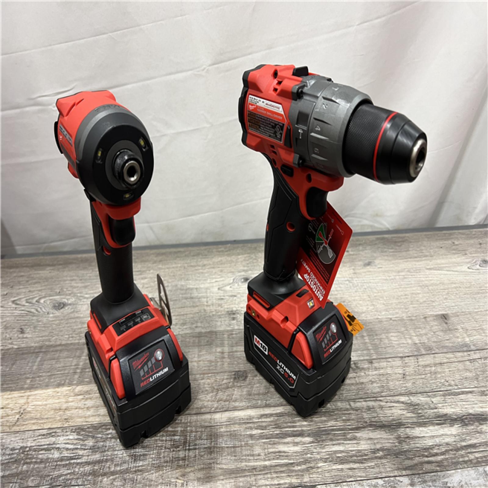 AS-IS Milwaukee M18 FUEL 18V Lithium-Ion Brushless Cordless Hammer Drill and Impact Driver Combo Kit (2-Tool) with 2 Batteries