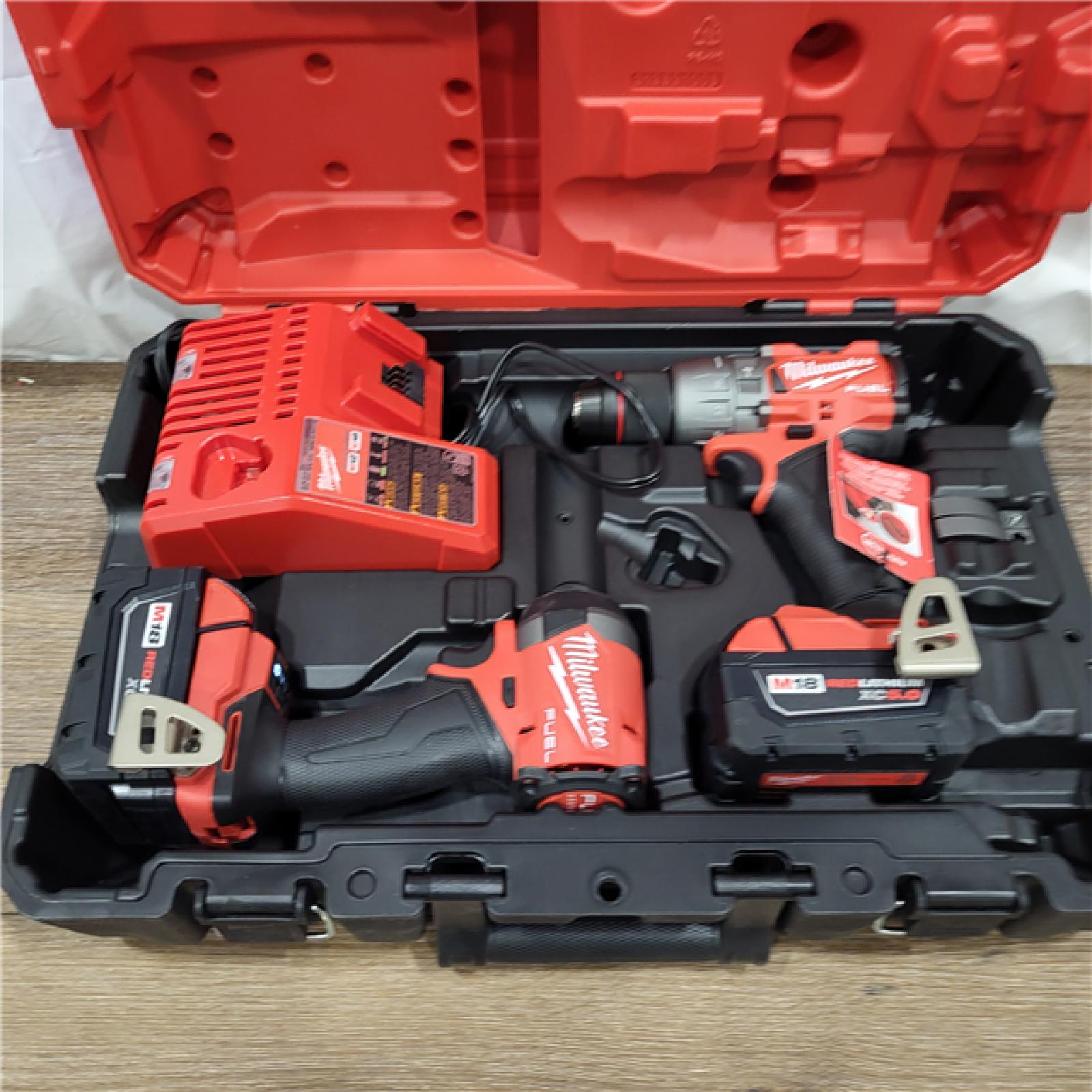 AS-IS M18 FUEL 18V Lithium-Ion Brushless Cordless Hammer Drill and Impact Driver Combo Kit (2-Tool) with 2 Batteries