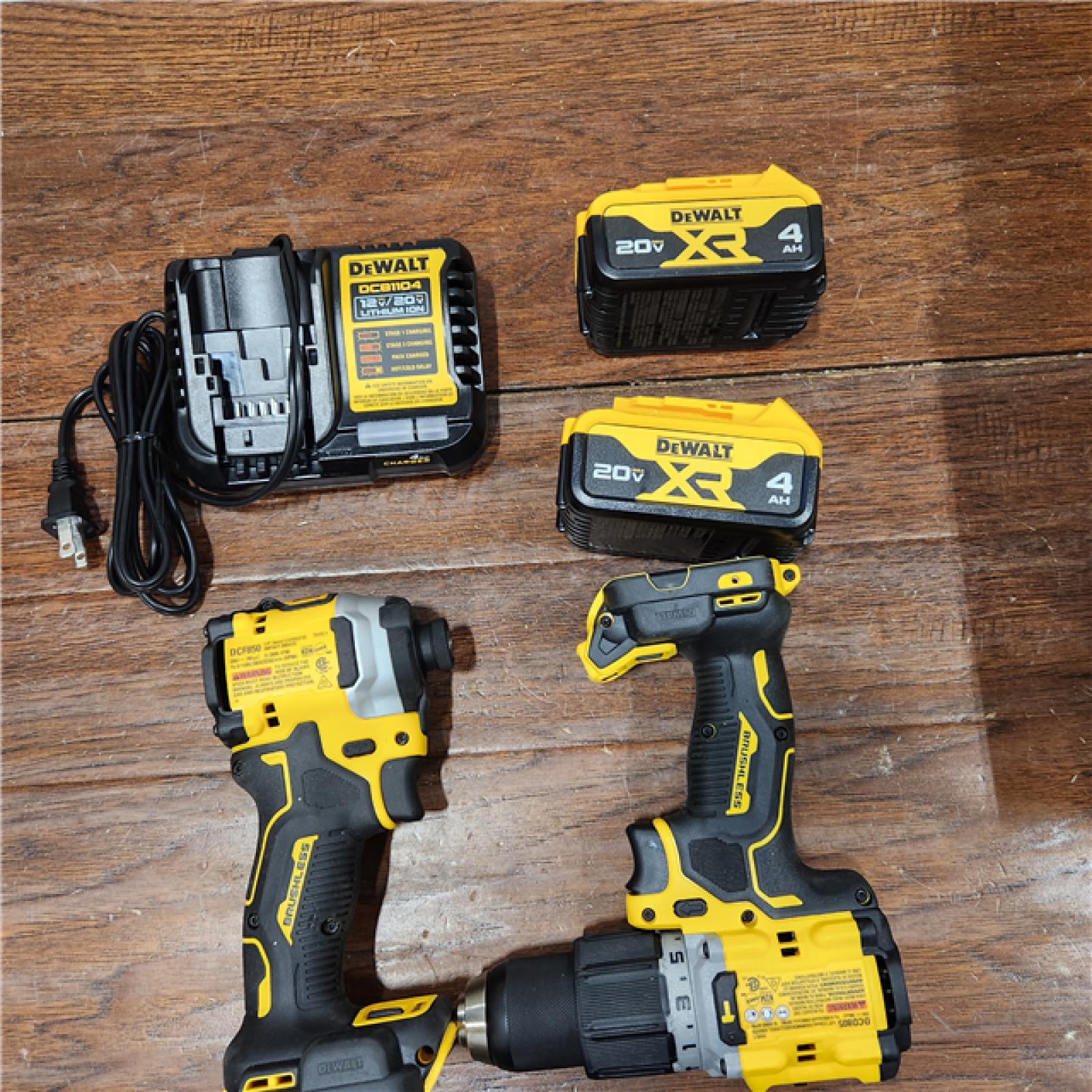 AS-IS 20V MAX XR Hammer Drill and ATOMIC Impact Driver 2 Tool Cordless Combo Kit with (2) 4.0Ah Batteries, Charger, and Bag