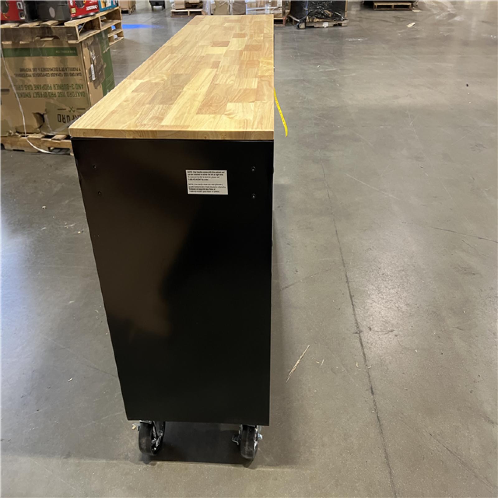 DALLAS LOCATION - Husky Standard Duty 72 in. W x 20 in. D 10-Drawer Black Mobile Workbench Cabinet with Solid Wood Top