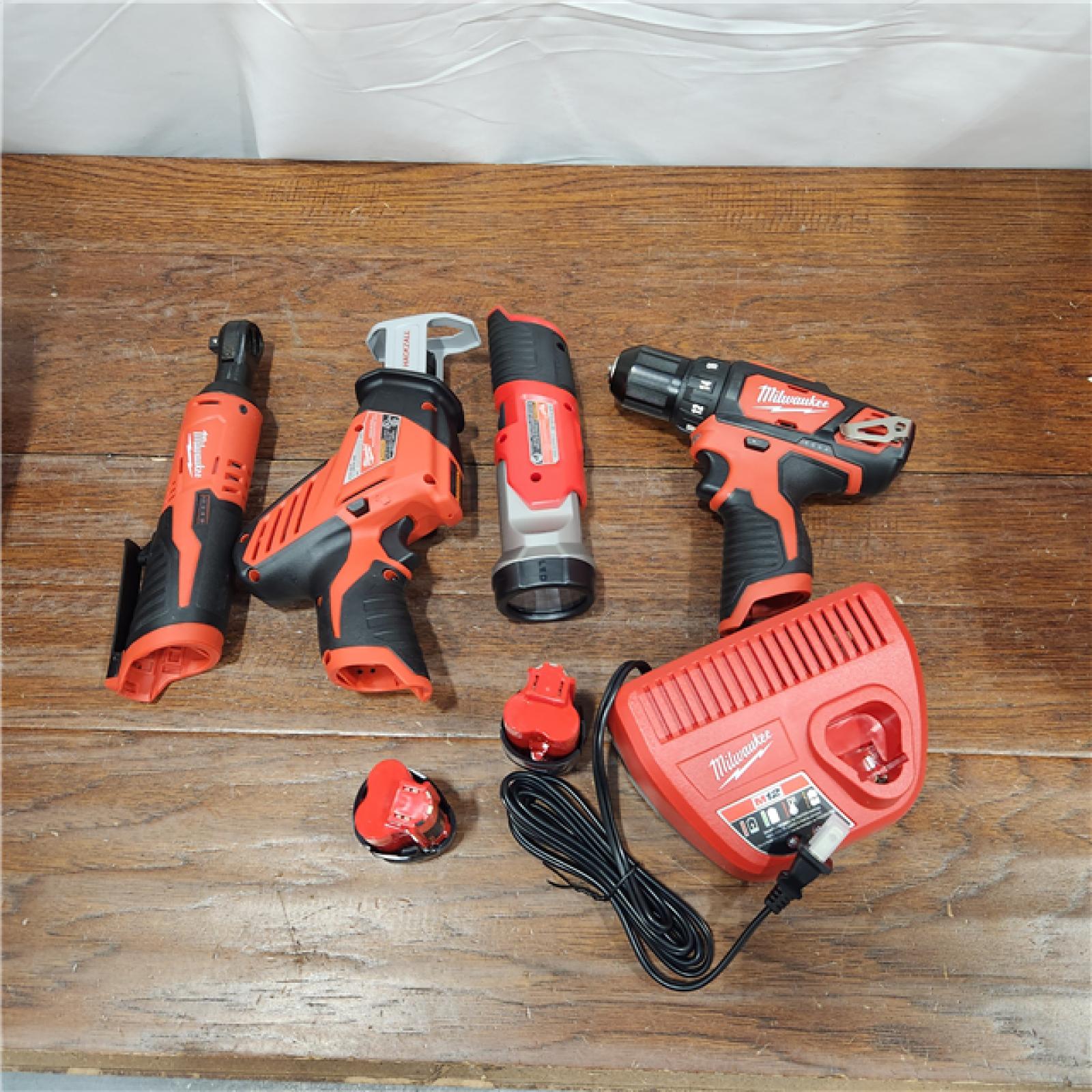 AS-IS MILWAUKEE M12 12V Lithium-Ion Cordless Combo Kit (5-Tool) with Two 1.5Ah Batteries, Charger & Tool Bag