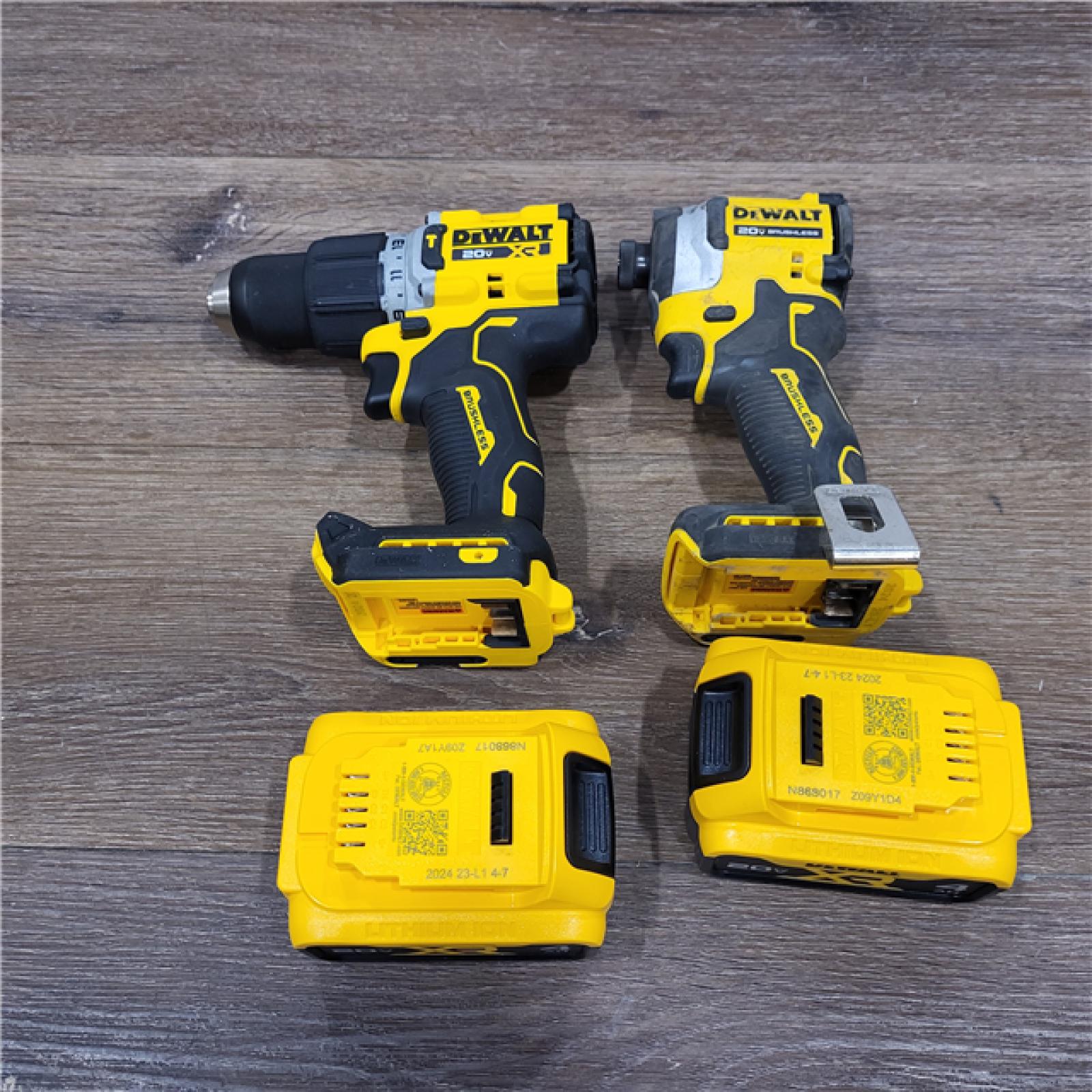 AS-IS DEWALT 20V MAX XR Hammer Drill and ATOMIC Impact Driver 2 Tool Cordless Combo Kit with (2) 4.0Ah Batteries, Charger, and Bag