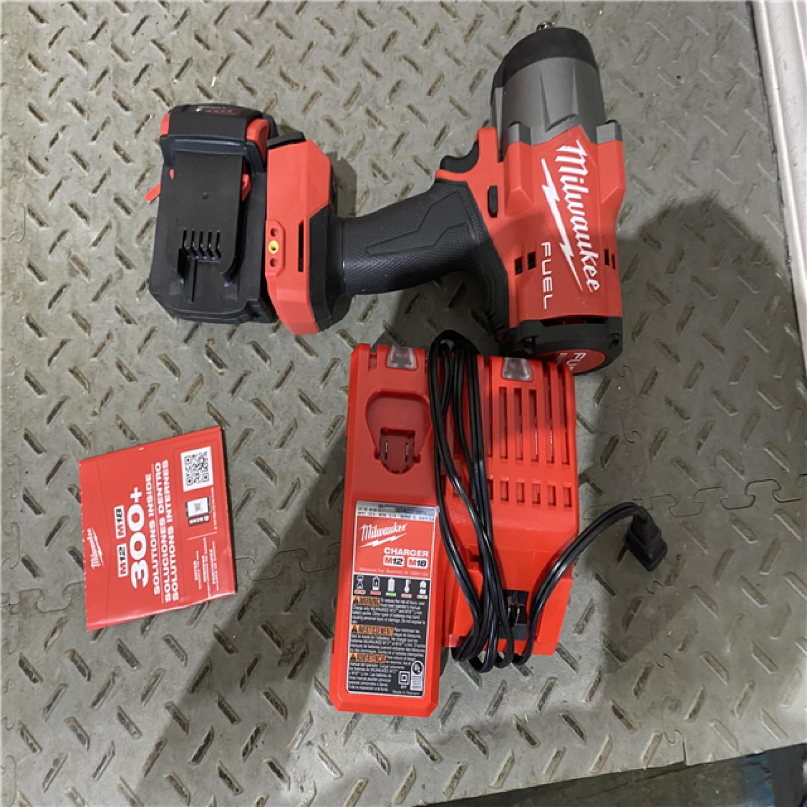 Houston location AS-IS Milwaukee 2967-21B M18 FUEL 1/2 High Torque Impact Wrench W/ Friction Ring 5.0Ah Kit