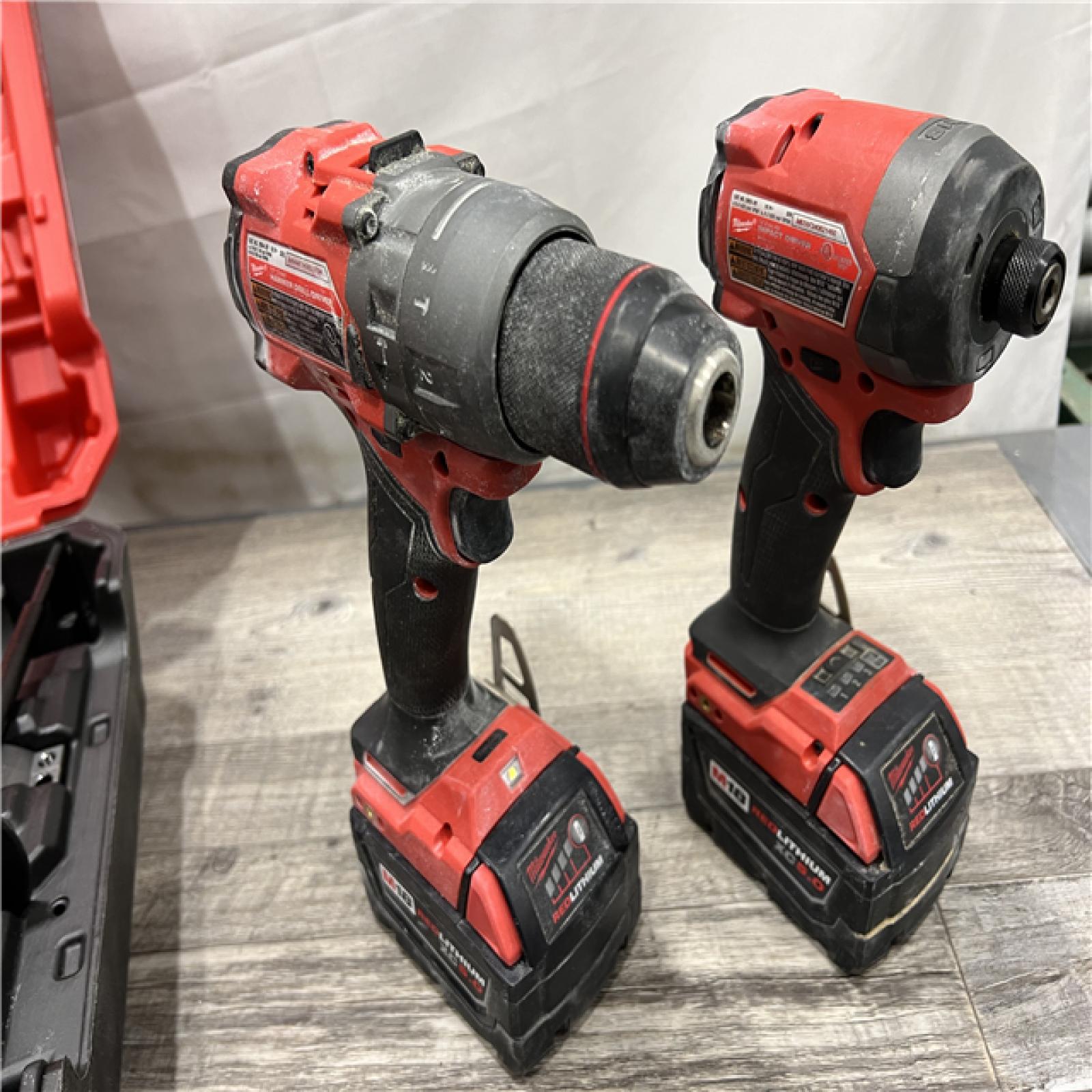 AS-IS Milwaukee M18 FUEL 18V Lithium-Ion Brushless Cordless Hammer Drill and Impact Driver Combo Kit (2-Tool) with 2 Batteries