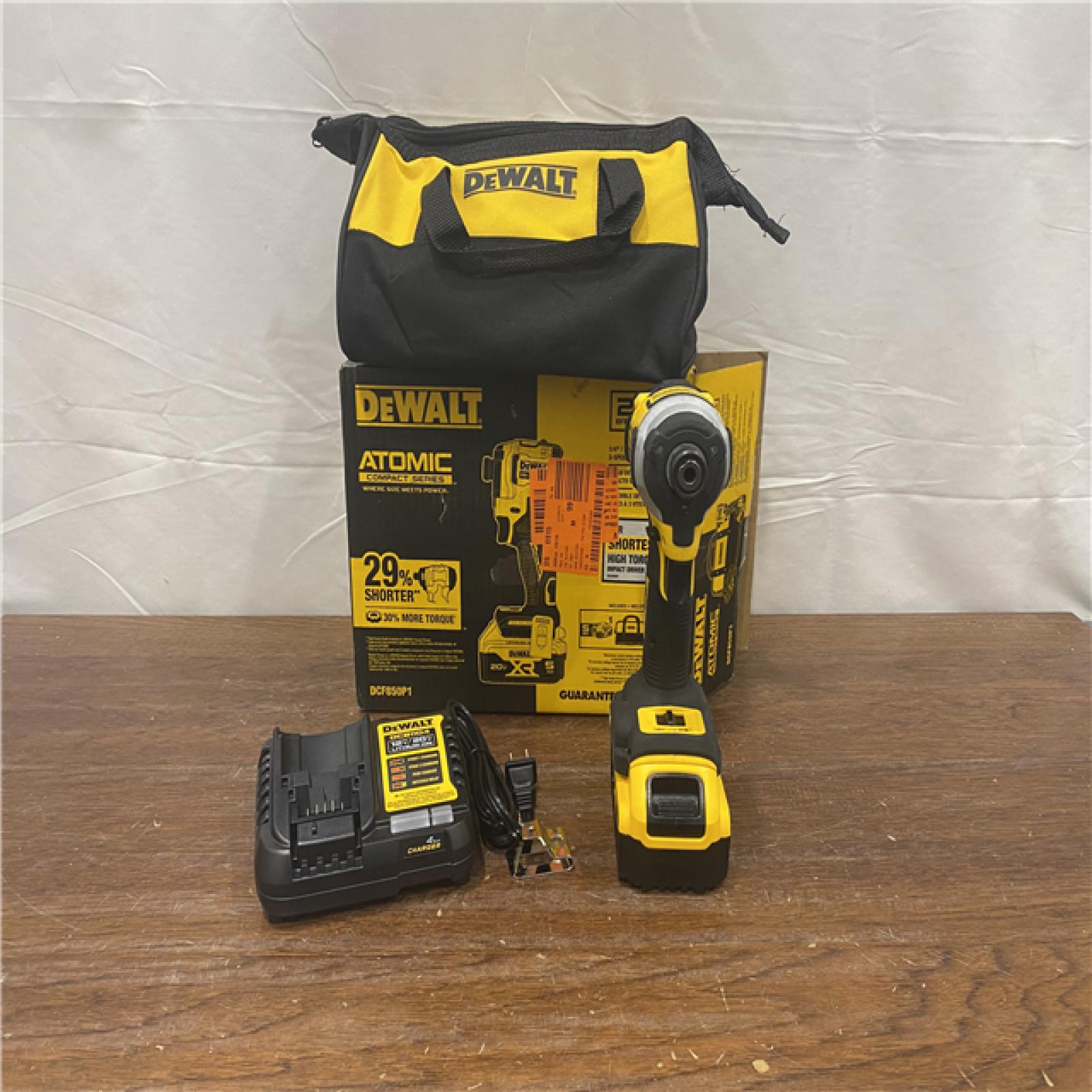 AS-IS DEWALT ATOMIC 20V MAX Lithium-Ion Cordless 1/4 in. Brushless Impact Driver Kit, 5 Ah Battery, Charger, and Bag