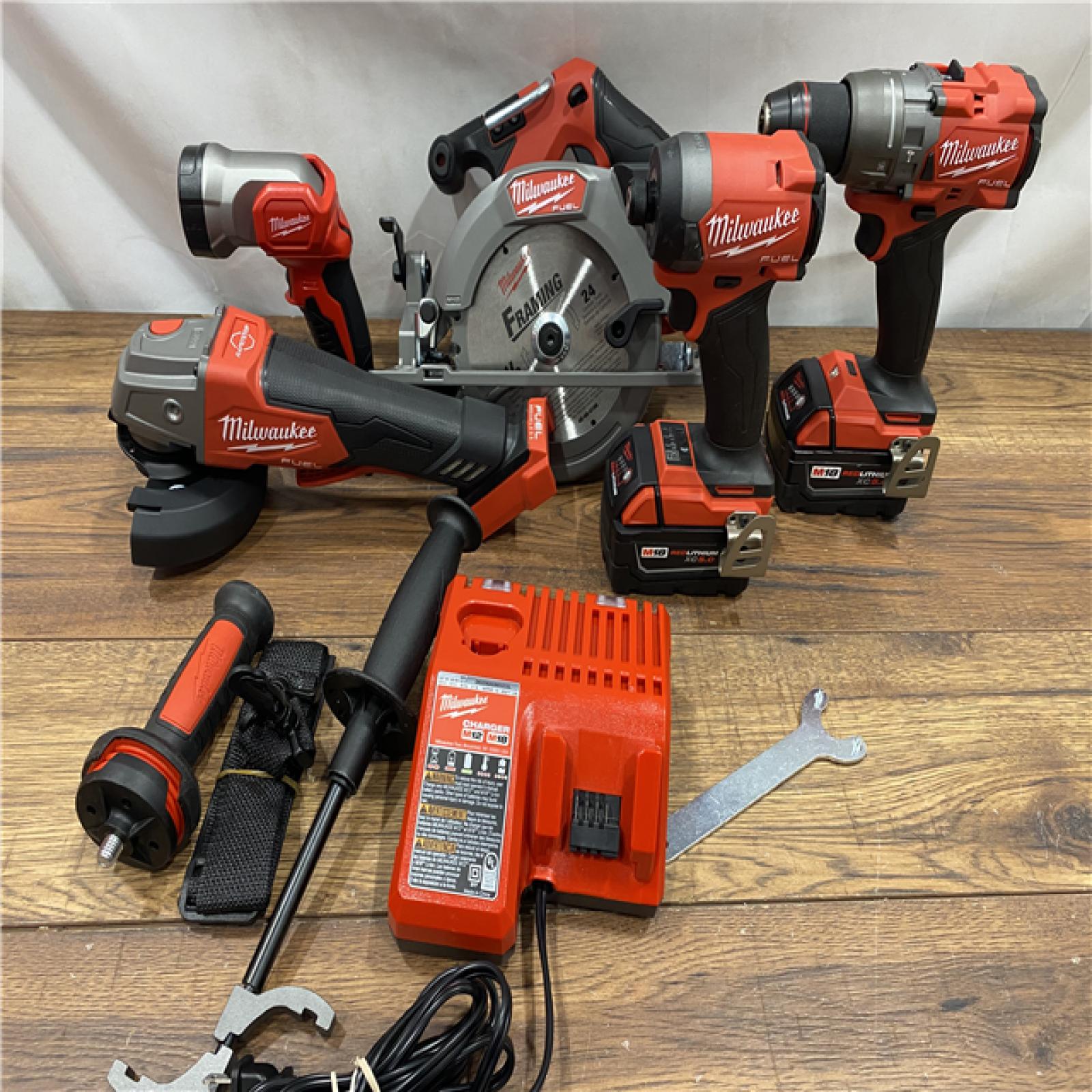 AS IS M18 18-Volt Lithium-Ion Brushless Cordless FUEL Combo Kit (5-Tool) with 2-Batteries, 1-Charger, and Tool Bag