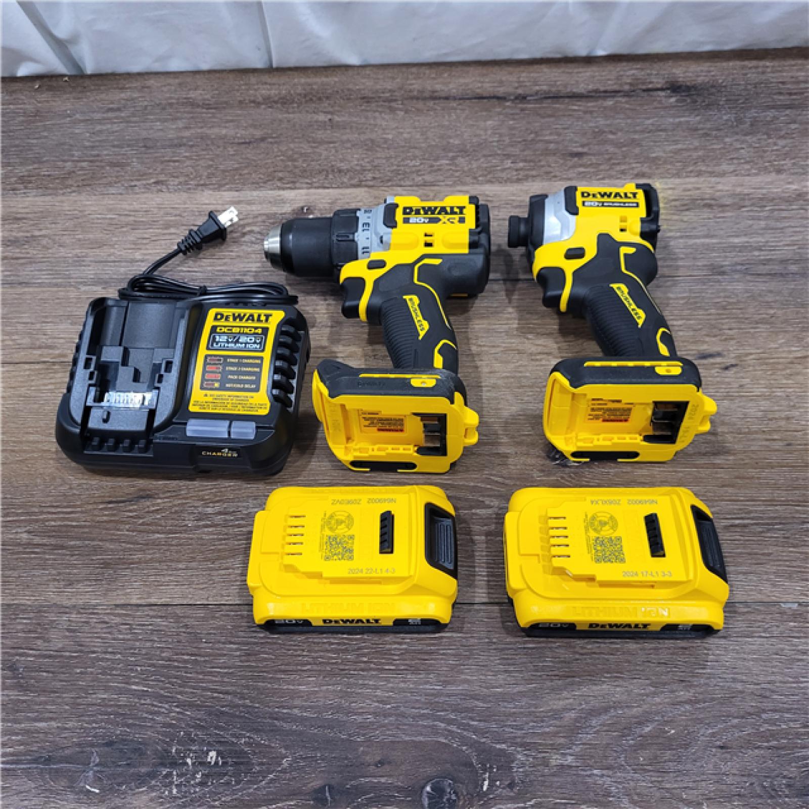 AS-IS DeWalt 20V MAX XR Cordless Drill/Driver, ATOMIC Impact Driver 2 Tool Combo Kit, (2) 2.0Ah Batteries, Charger, and Bag