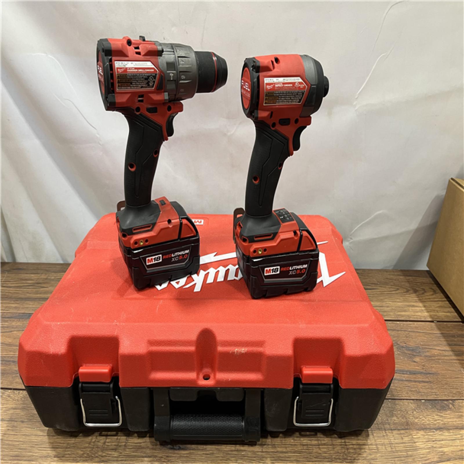 AS-IS Milwaukee M18 FUEL 18V Lithium-Ion Brushless Cordless Hammer Drill and Impact Driver Combo Kit (2-Tool) with 2 Batteries