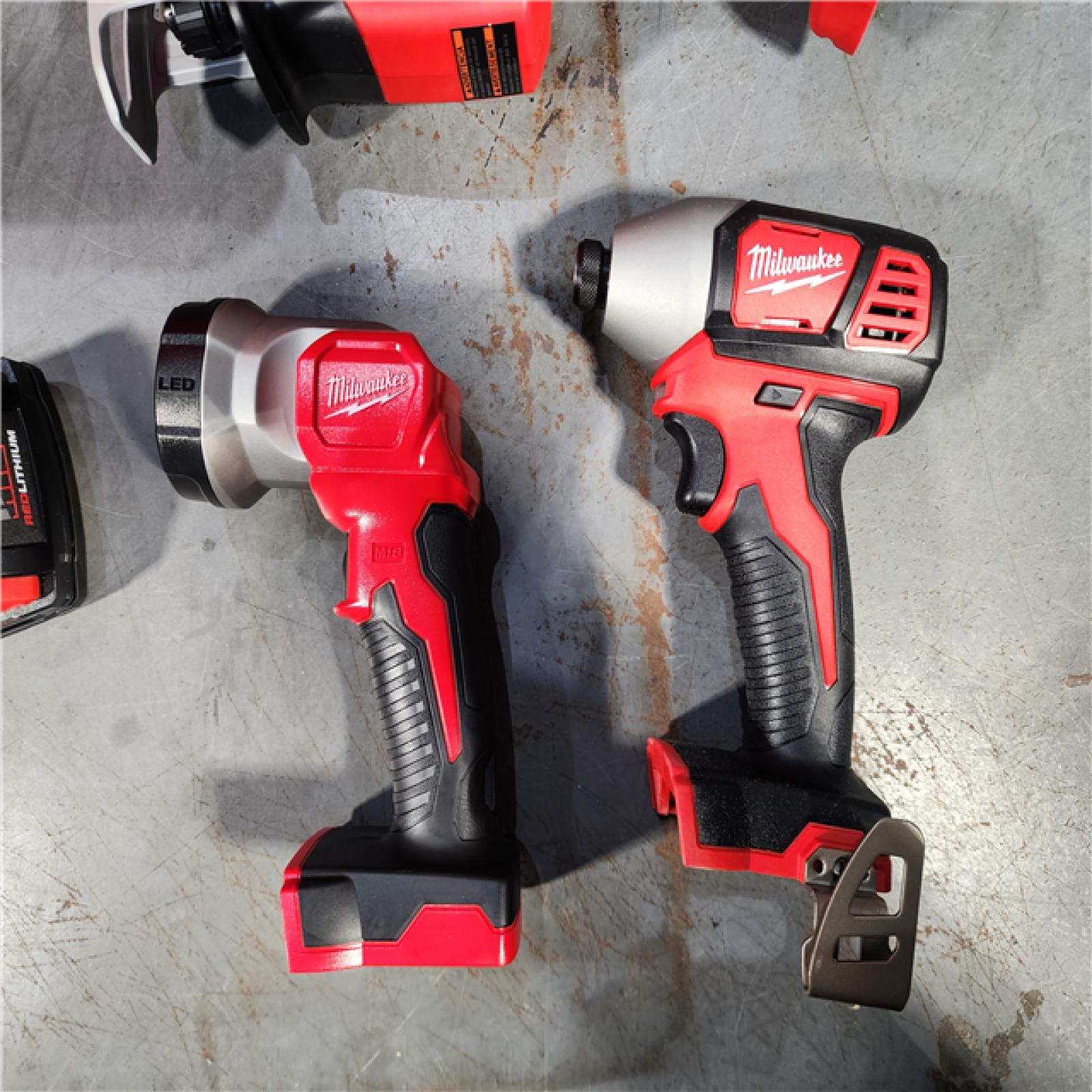 HOUSTON LOCATION - AS-IS (APPEARS LIKE NEW) Milwaukee M18 18-Volt Lithium-Ion Cordless Combo Tool Kit (4-Tool) with (1) 3.0Ah and (1) 1.5Ah Battery, (1) Charger, (1) Tool Bag