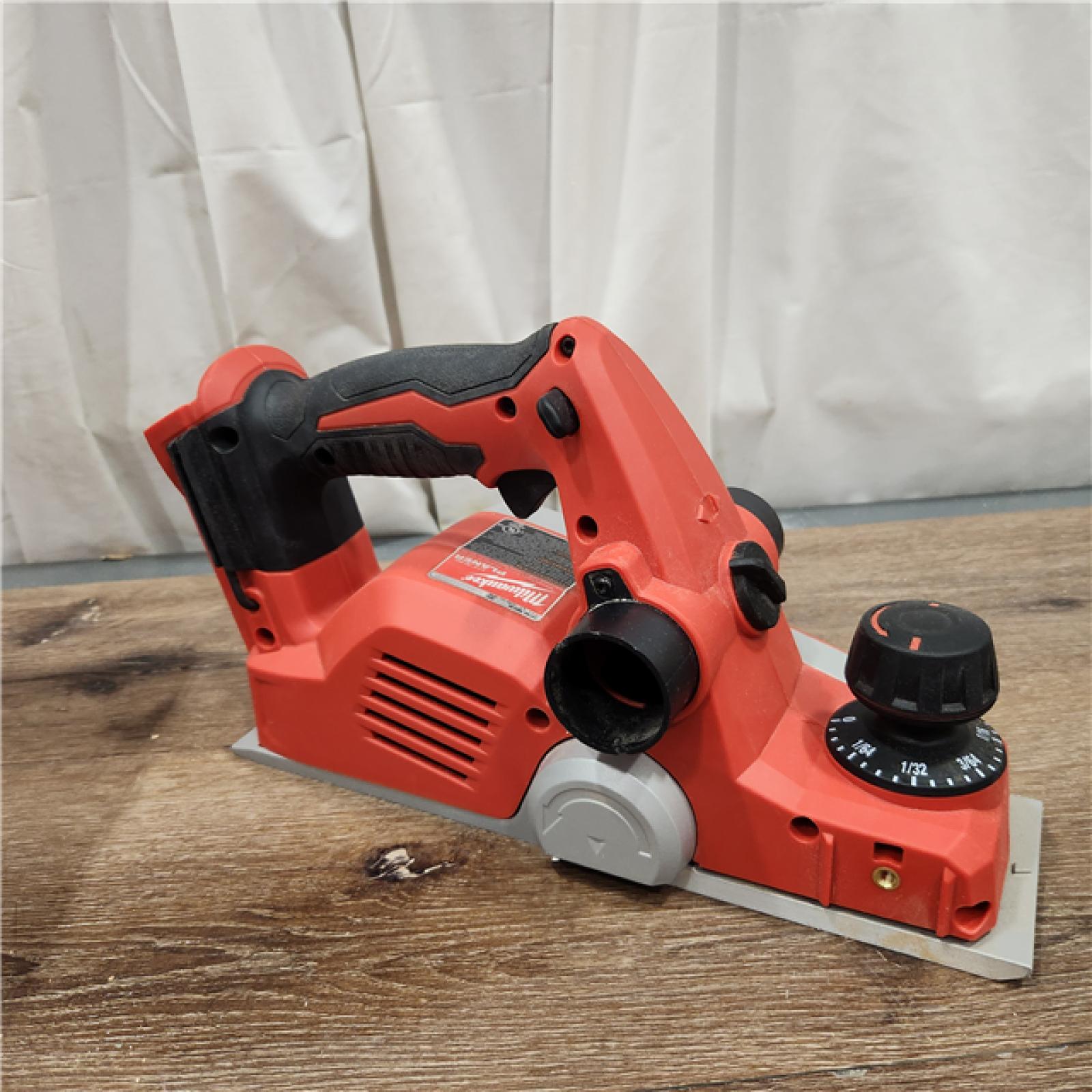 AS-IS Milwaukee M18 18-Volt Lithium-Ion Cordless 3-1/4 in. Planer (Tool-Only)