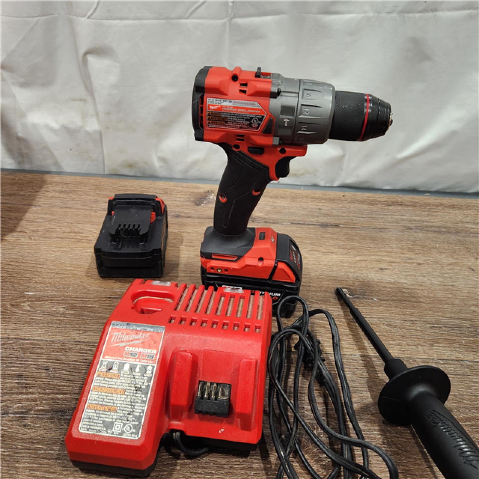 AS-IS Milwaukee 2904-22 Hammer Drill Driver Kit with Batteries  Charger & Tool Case  Red