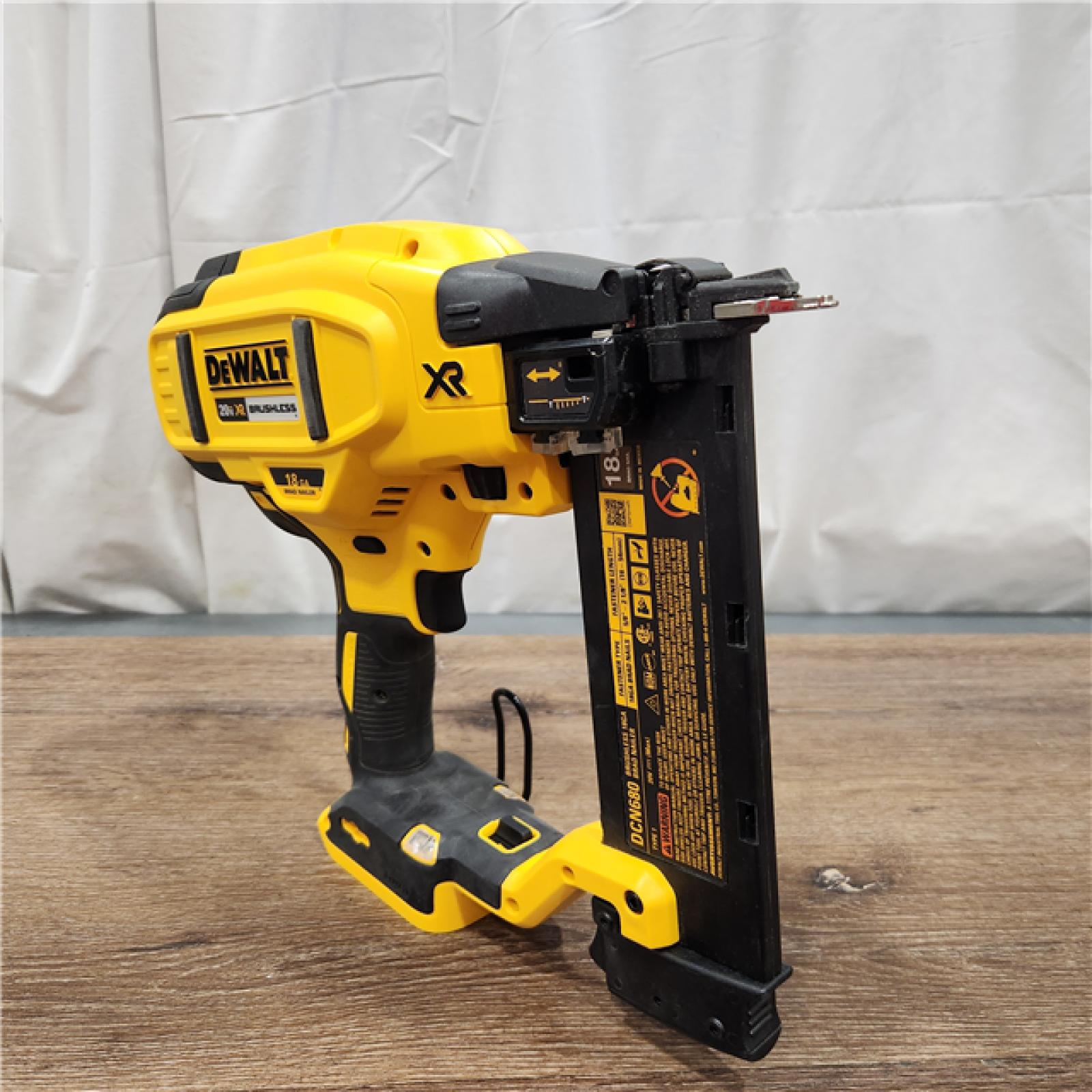 AS-IS DeWalt 20V MAX XR Lithium-Ion Electric Cordless 18-Gauge Brad Nailer (Tool Only)