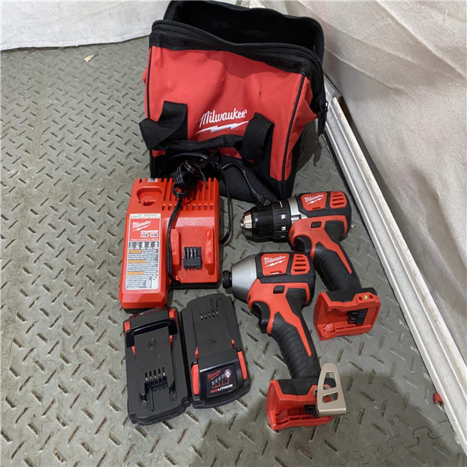 Houston location AS-IS Milwaukee Electric Tools 2691-22 MILWAUKEE M18 COMBO KITS LIKE NEW