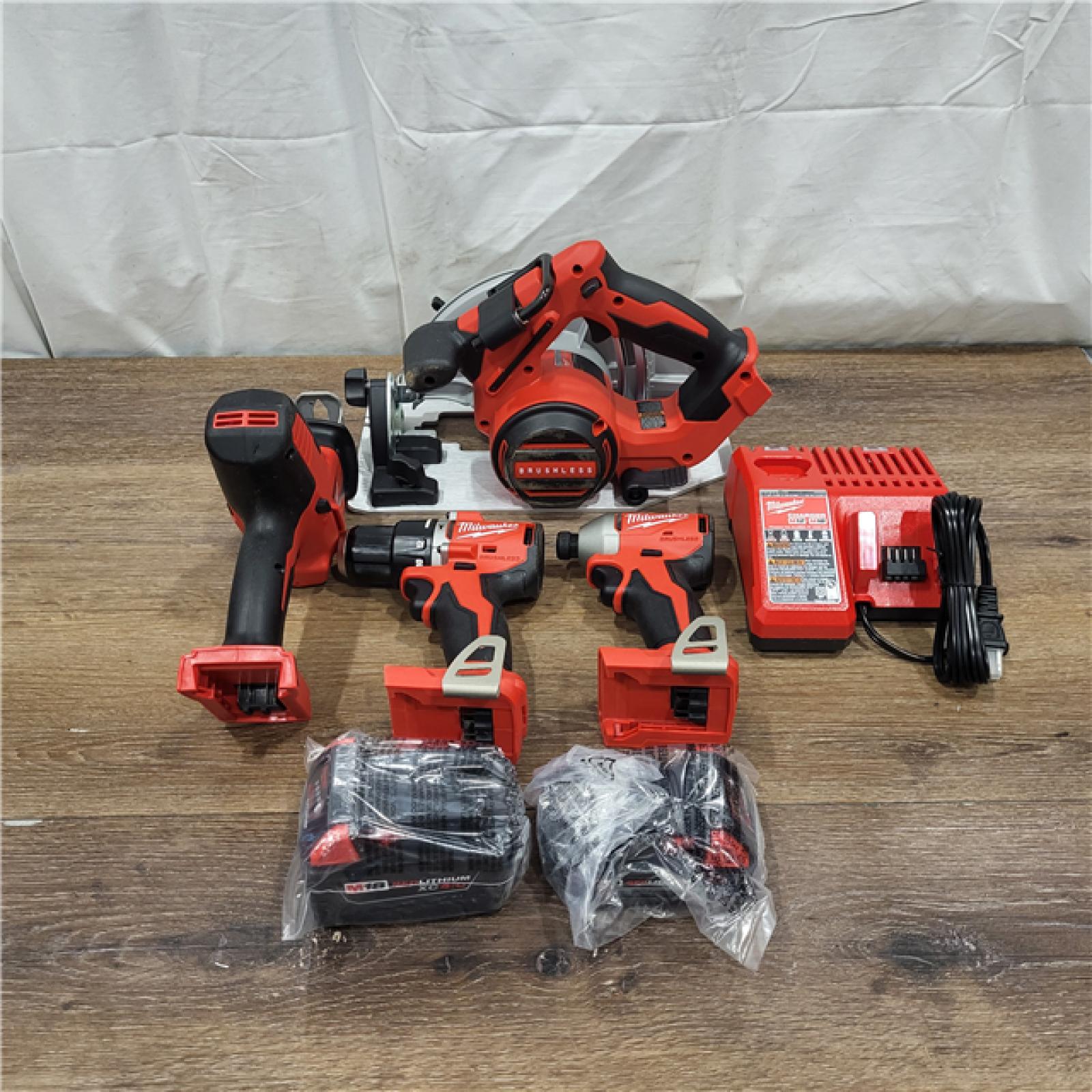 AS-IS M18 18-Volt Lithium-Ion Brushless Cordless Combo Kit (4-Tool) with 2-Batteries, 1-Charger and Tool Bag