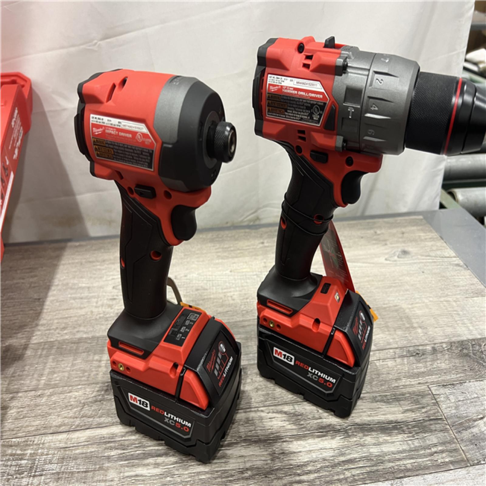 AS-IS MILWAUKEE M18 FUEL 18V Lithium-Ion Brushless Cordless Hammer Drill and Impact Driver Combo Kit (2-Tool) with 2 Batteries