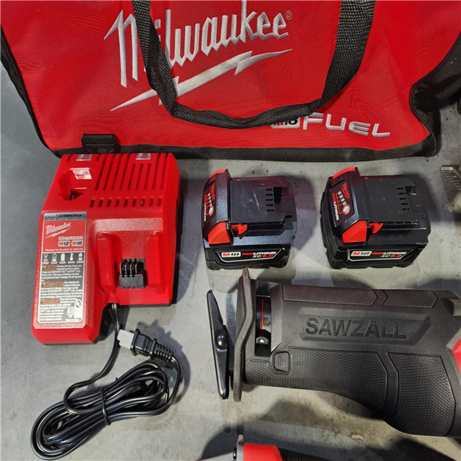 HOUSTON LOCATION - AS-IS (APPEARS LIKE NEW) MILWAUKEE 7 TOOL COMBO KIT W/ (2) 5.0 AH BATTERY, (2) CARRYING BAG & CHARGER