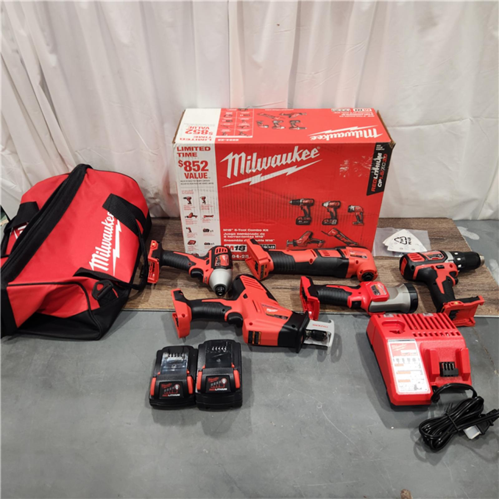 AS IS M18 18V Lithium-Ion Cordless Combo Kit (5-Tool) with (2) Batteries, Charger and Tool Bag