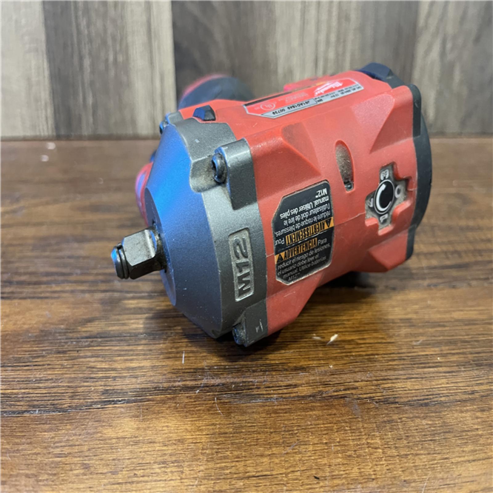 AS-IS Milwaukee FUEL 12V Lithium-Ion Brushless Cordless Stubby 3/8 in. Impact Wrench (Tool-Only)