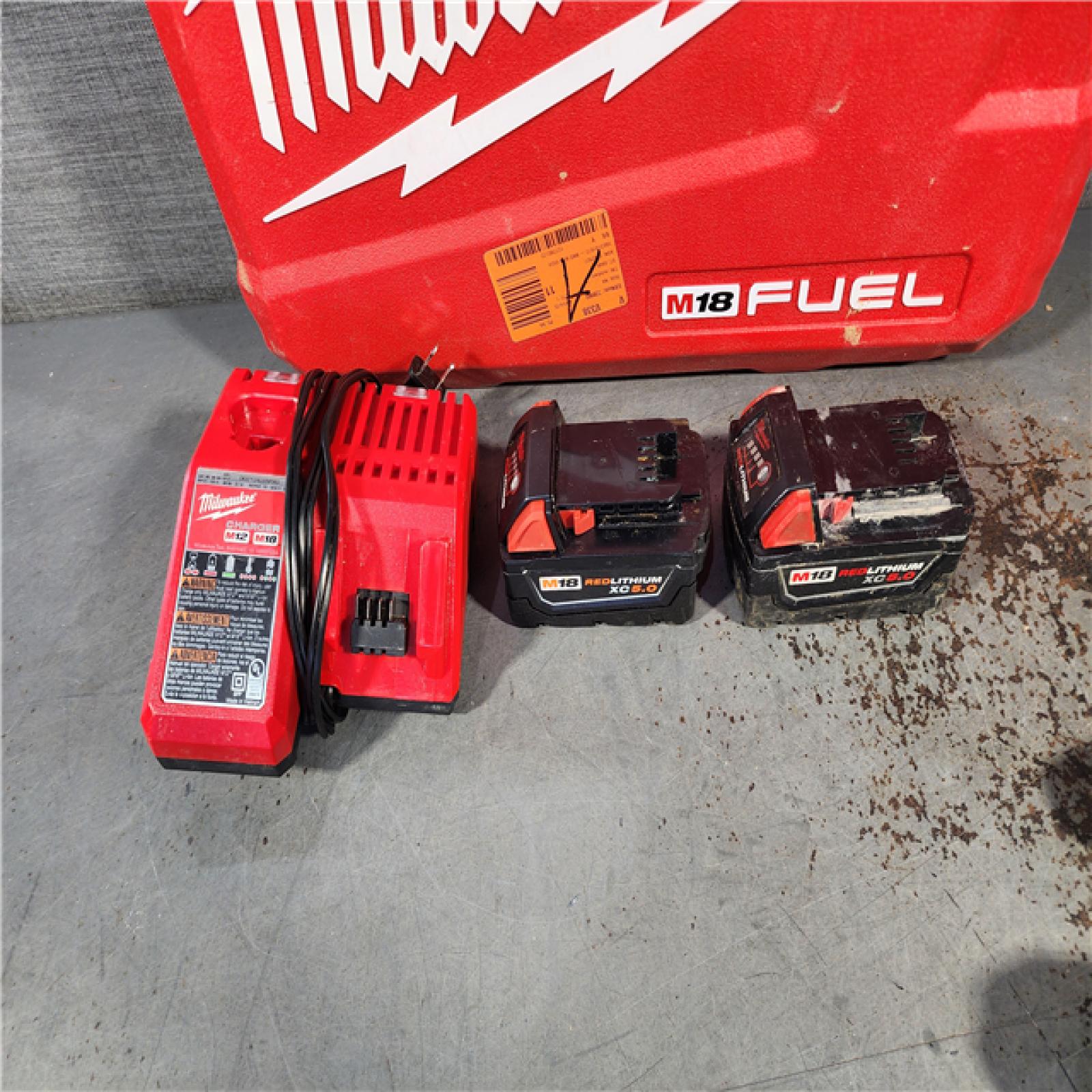 HOUSTON LOCATION - AS-IS Milwaukee M18 FUEL 18V Lithium-Ion Brushless Cordless Hammer Drill and Impact Driver Combo Kit (2-Tool) with 2 Batteries