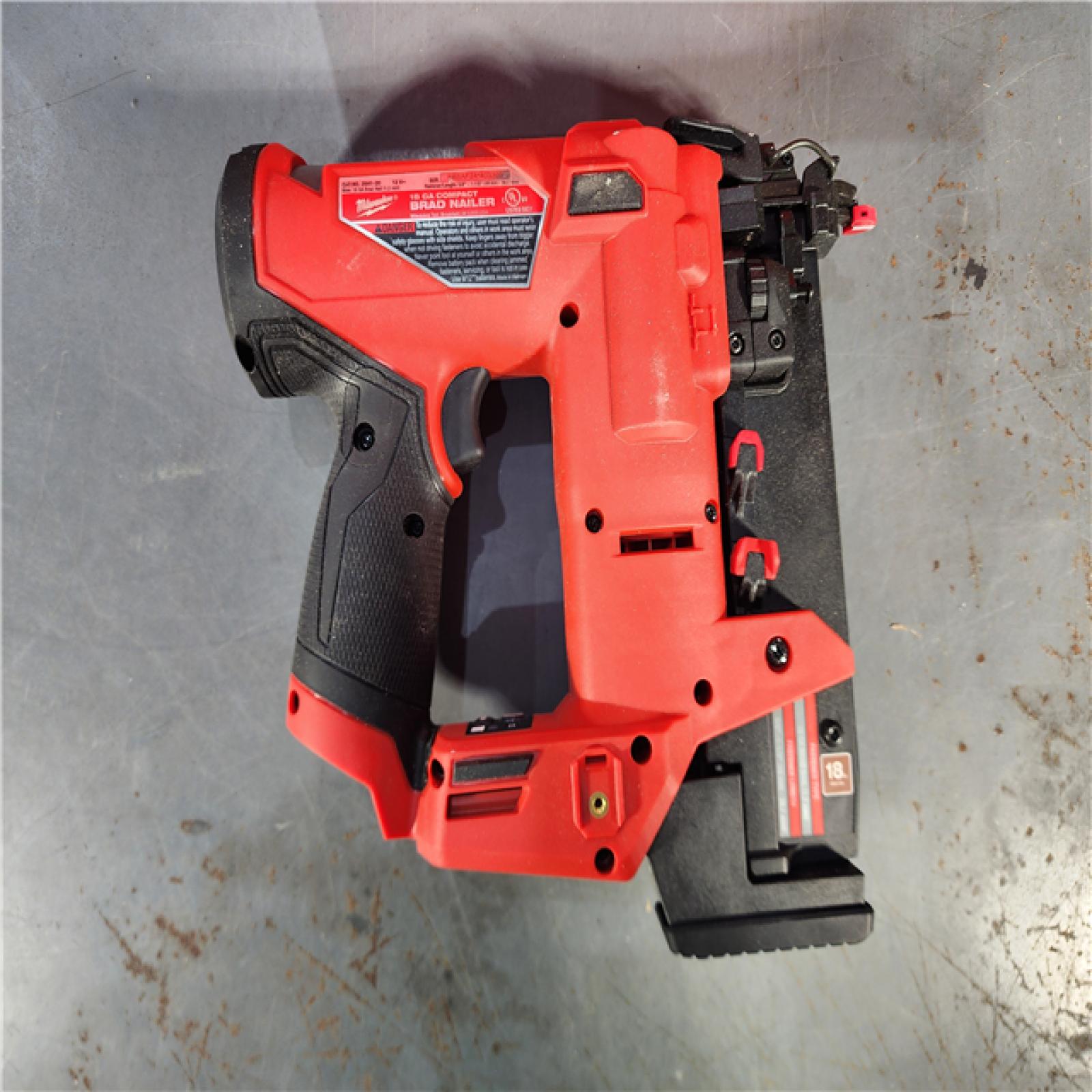 HOUSTON LOCATION - AS-IS (APPEARS LIKE NEW) M12 FUEL 12-Volt Lithium-Ion Brushless Cordless 18-Guage Compact Brad Nailer (Tool Only)