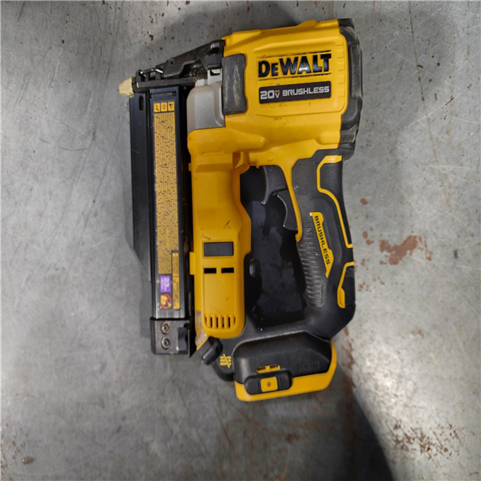 HOUSTON LOCATION - AS-IS DEWALT ATOMIC 20V MAX Lithium Ion Cordless 23 Gauge Pin Nailer Kit with 2.0Ah Battery and Charger