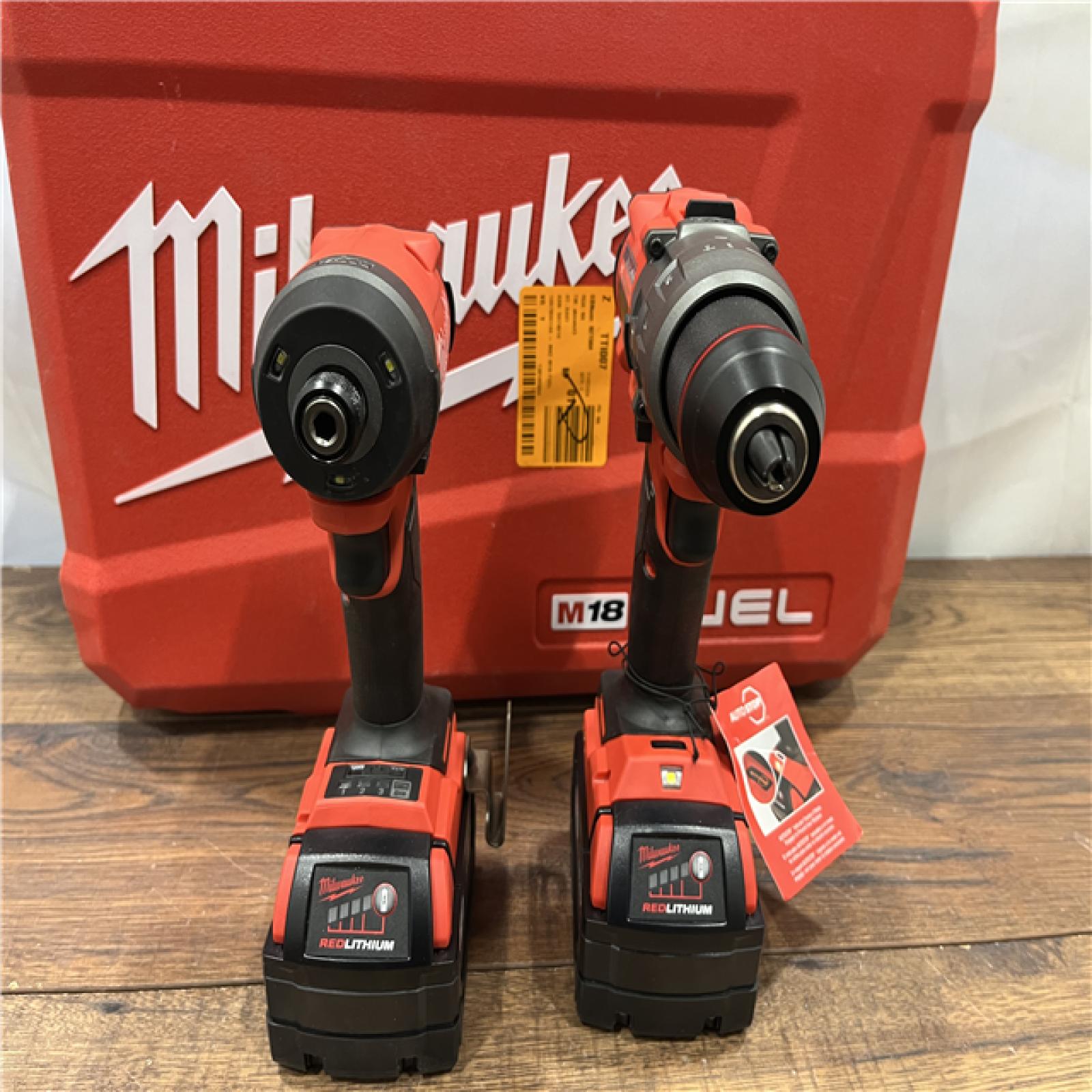 AS IS Milwaukee M18 FUEL 18V Lithium-Ion Brushless Cordless Hammer Drill and Impact Driver Combo Kit (2-Tool) with 2 Batteries