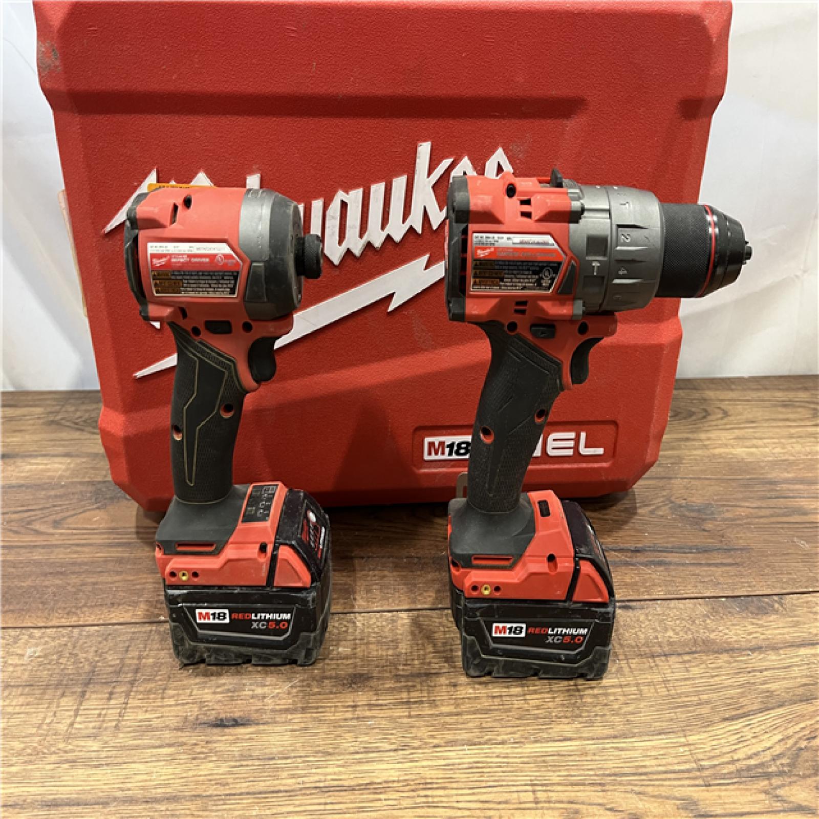 AS IS Milwaukee M18 FUEL 18V Lithium-Ion Brushless Cordless Hammer Drill and Impact Driver Combo Kit (2-Tool) with 2 Batteries