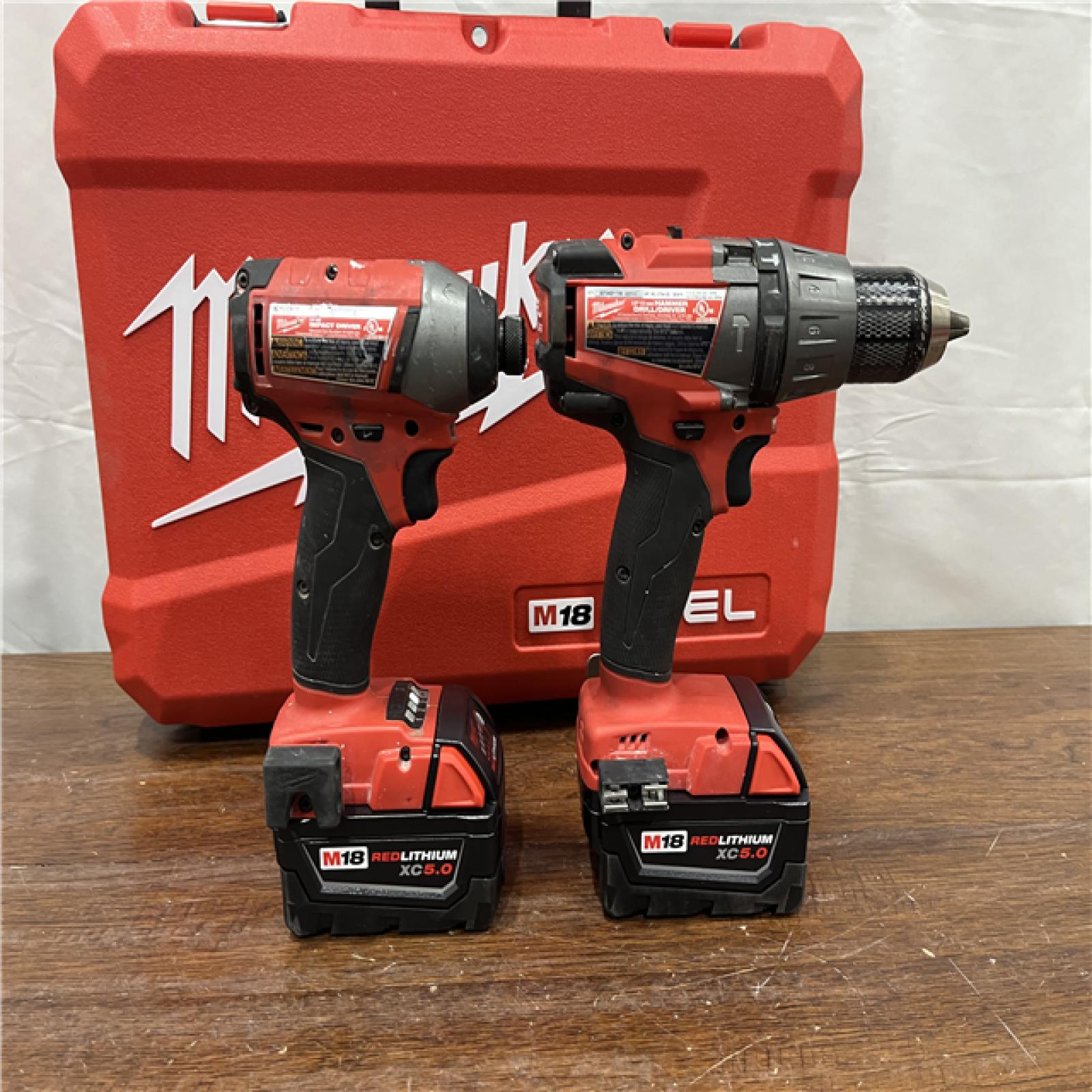 AS-IS Milwaukee M18 FUEL 18V Lithium-Ion Brushless Cordless Hammer Drill and Impact Driver Combo Kit (2-Tool) with 2 Batteries