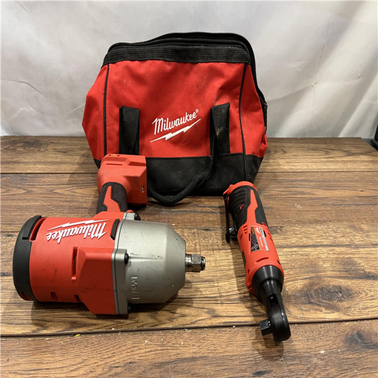 AS IS MILWAWKEE M12/M18 12/18V Lithium-Ion Cordless 3/8 in. Ratchet and 1/2 in. High Torque Impact Wrench with Friction Ring Combo Kit