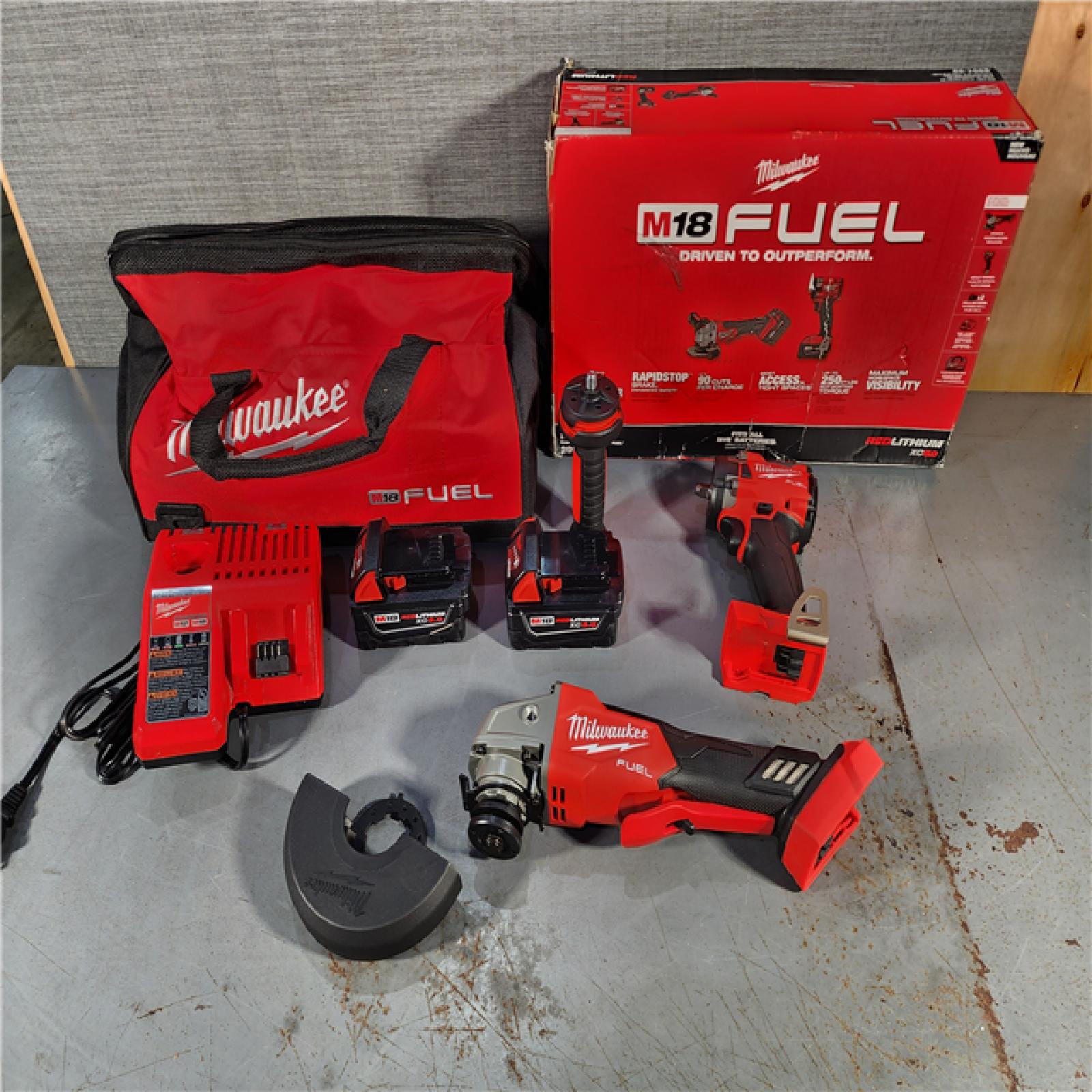 HOUSTON LOCATION - AS-IS (APPEARS LIKE NEW) M18 FUEL 18V Lithium-Ion Brushless Cordless Grinder & 3/8 in. Impact Wrench Combo Kit (2-Tool) W/ Two 5Ah Batteries